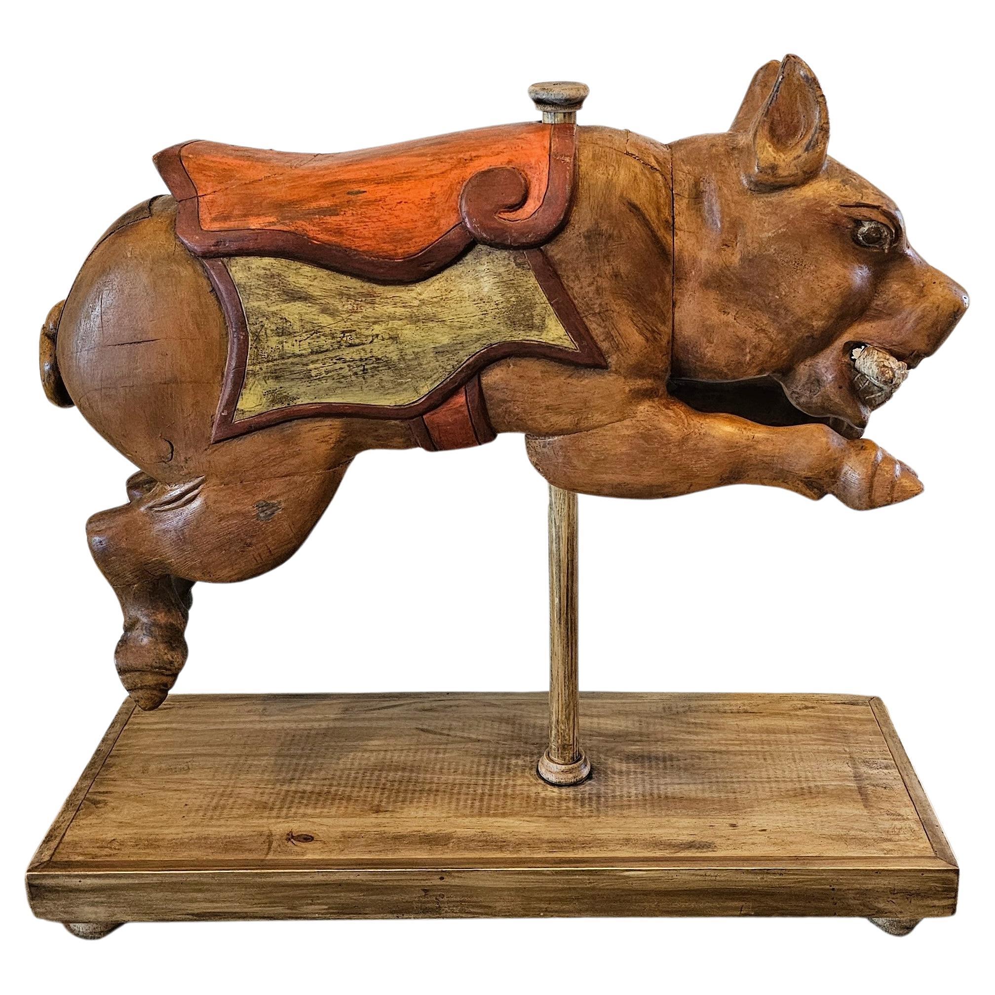 A rare and whimsical vintage Mexican carnival amusement ride carousel pig attributed to the Higareda workshop.

This ultra charming carousel pig carving was made in a smaller scale for a traveling carnival with a carousel, making it the ideal scale