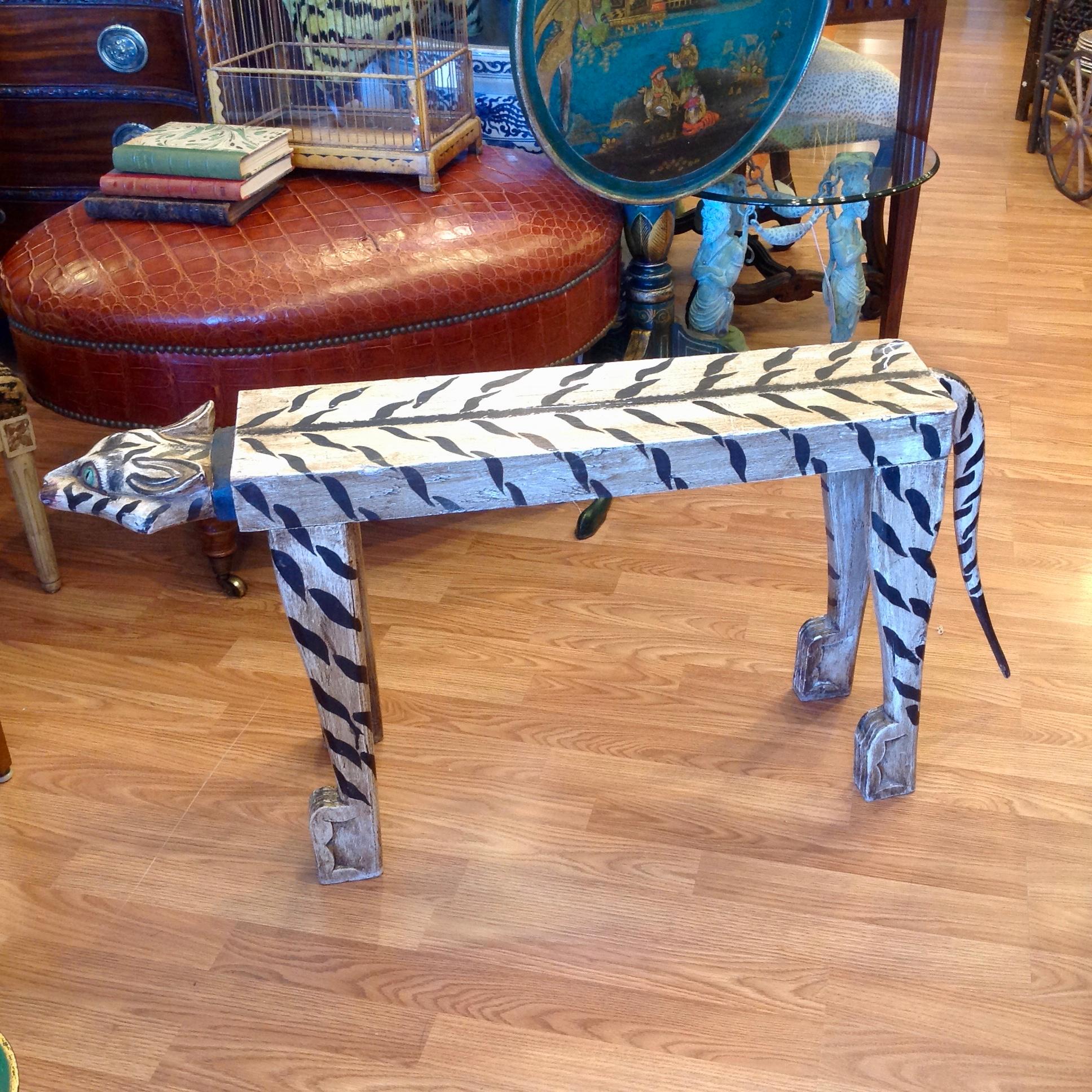 An amusing and charming folk art bench of a not so menacing tiger.
Perfectly wonderful. (Measurements include tail). Bench seat measures 28.5