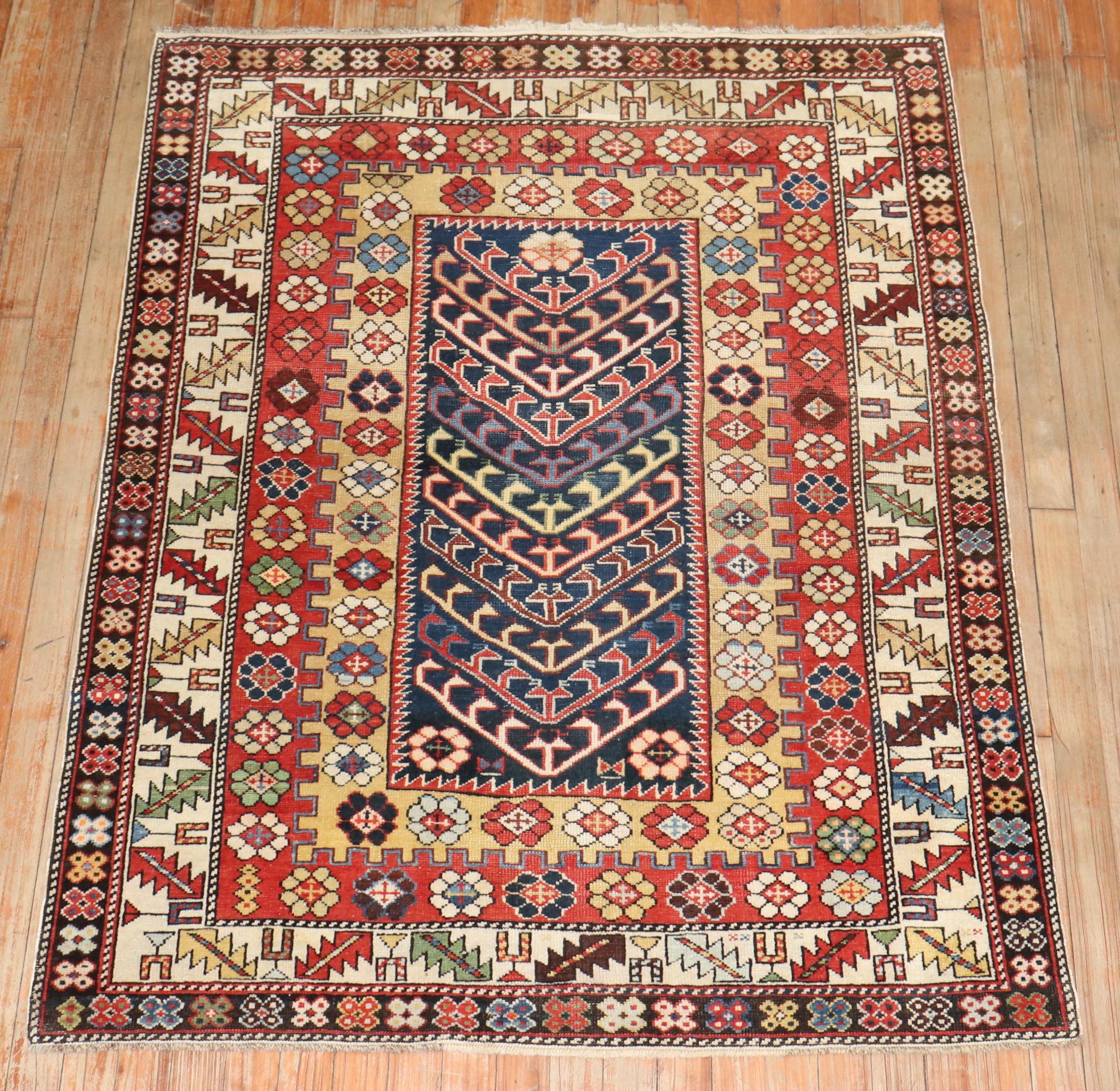 An early 20th century colorful Caucasian rug with a whimsical Directional motif and multi band border

Measures: 3'9