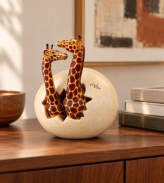 Whimsical Ceramic Giraffes Hatching from Egg in the Style of Sergio Bustamante