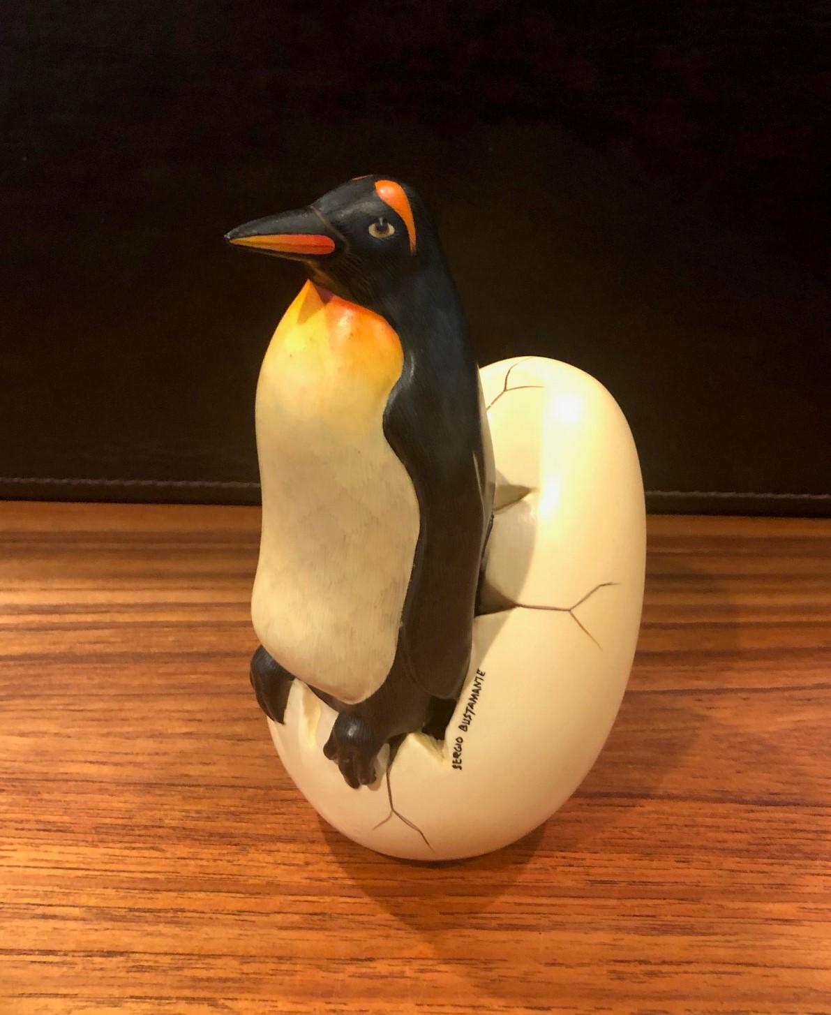 Hand-Painted Whimsical Ceramic Hatching Penguin from Egg Sculpture by Sergio Bustamante