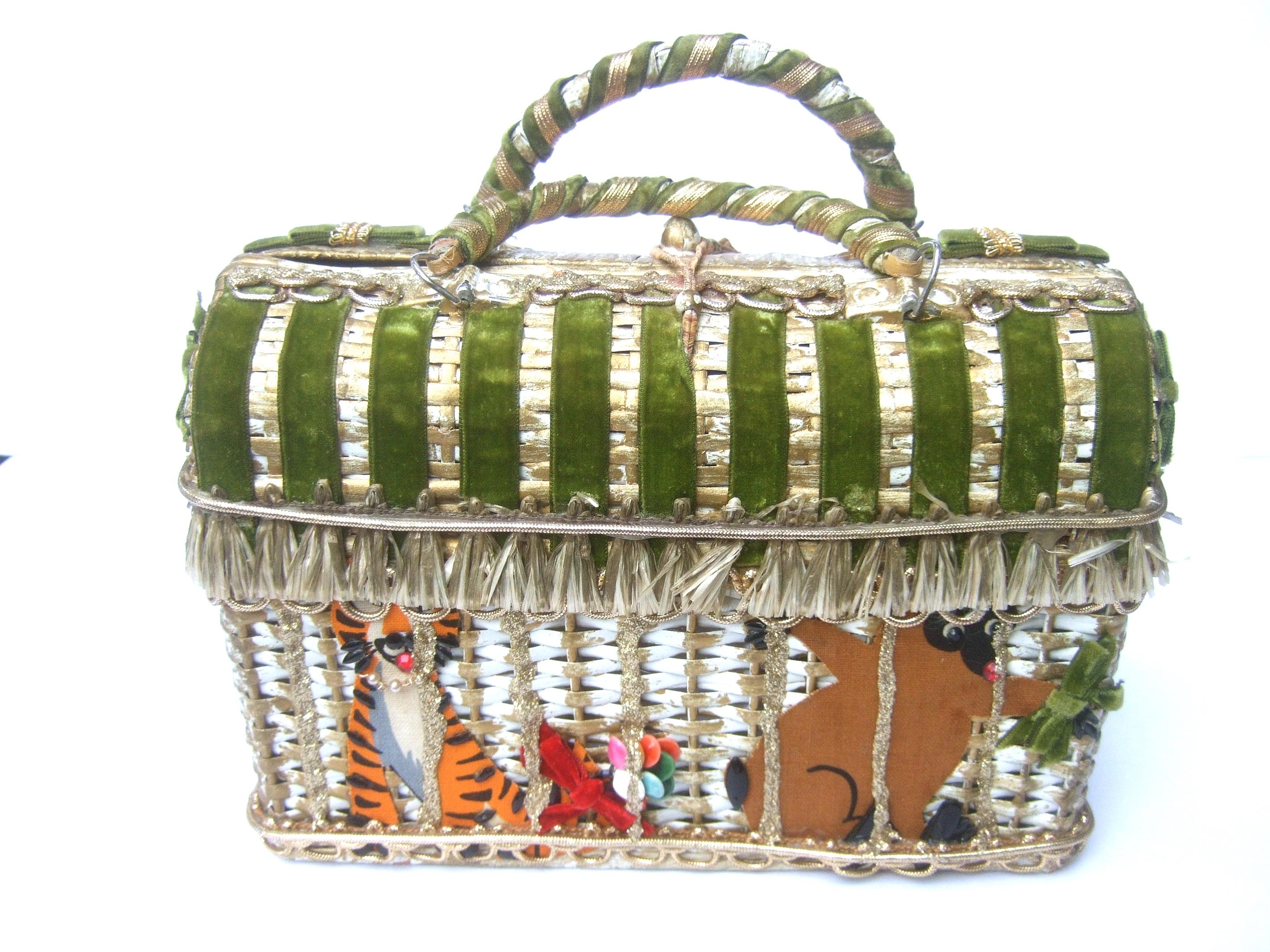 Whimsical circus theme wicker box purse handbag by Soure' NY
The unique mid-century wicker box purse is designed 
with a collection of exotic applique jungle animals 
peeking thru gold metallic vertical mock bars 

The top front section of the