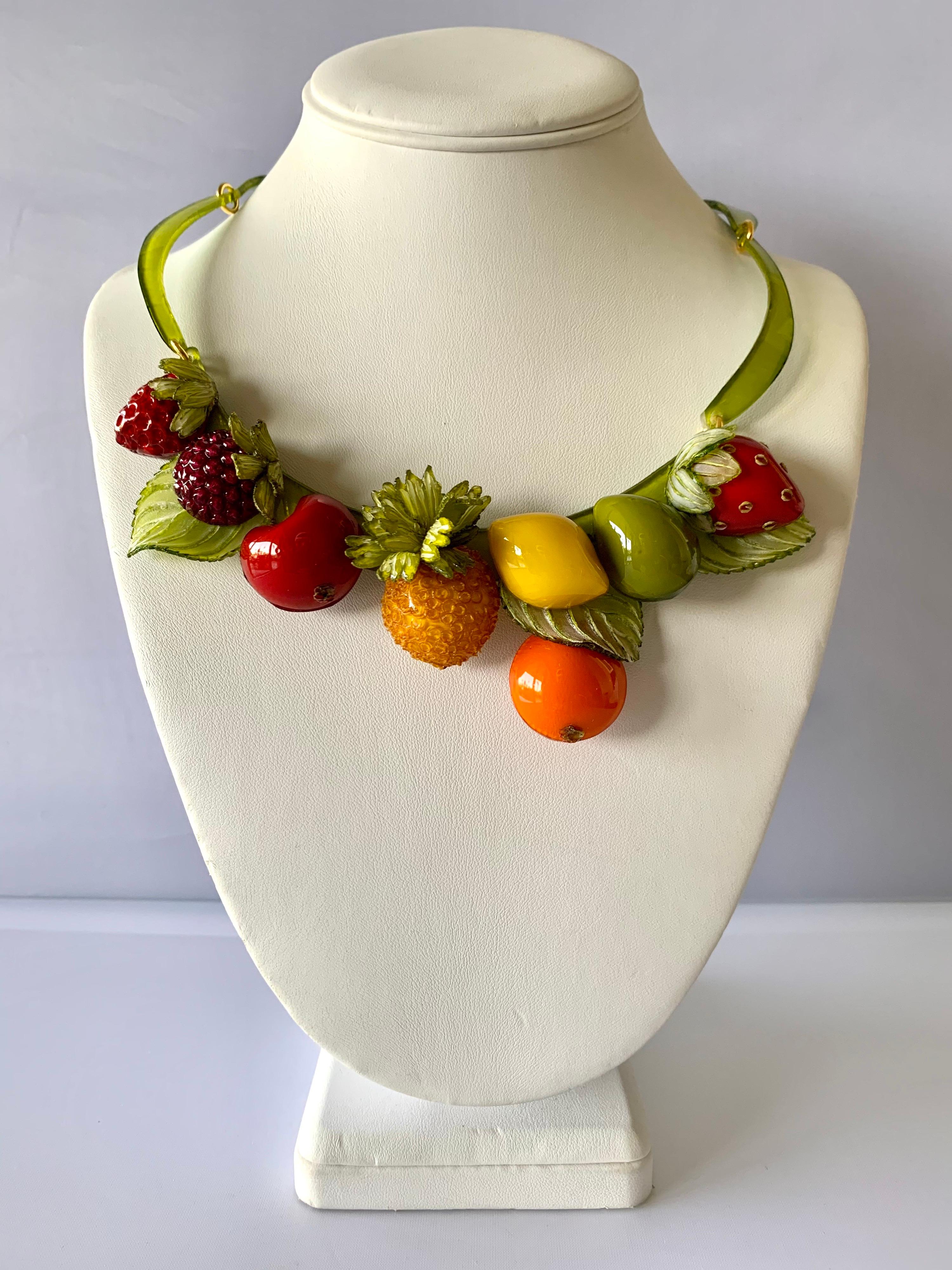 Contemporary designer fruit statement necklace by Cilea Paris - the bold necklace is comprised out of a row of highly adorned enameline (resin and enamel) featuring a plethora of fruit. Lightweight and easy to wear, excellent condition, and