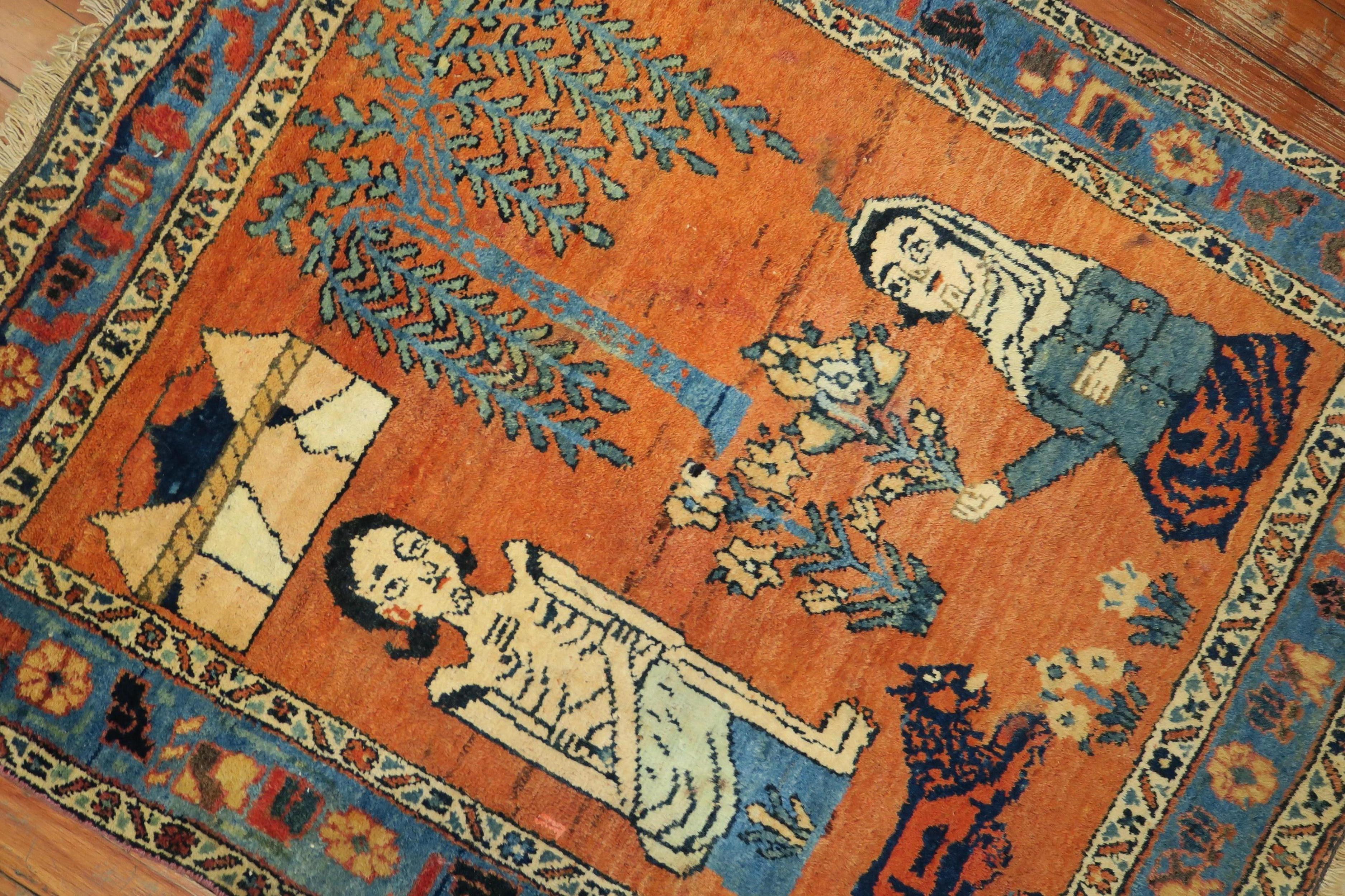 One of a kind mid-20th century decorative Northwest Persian Pictorial rug with 2 women and a dog on a pumpkin color field. 

Measures: 2'6