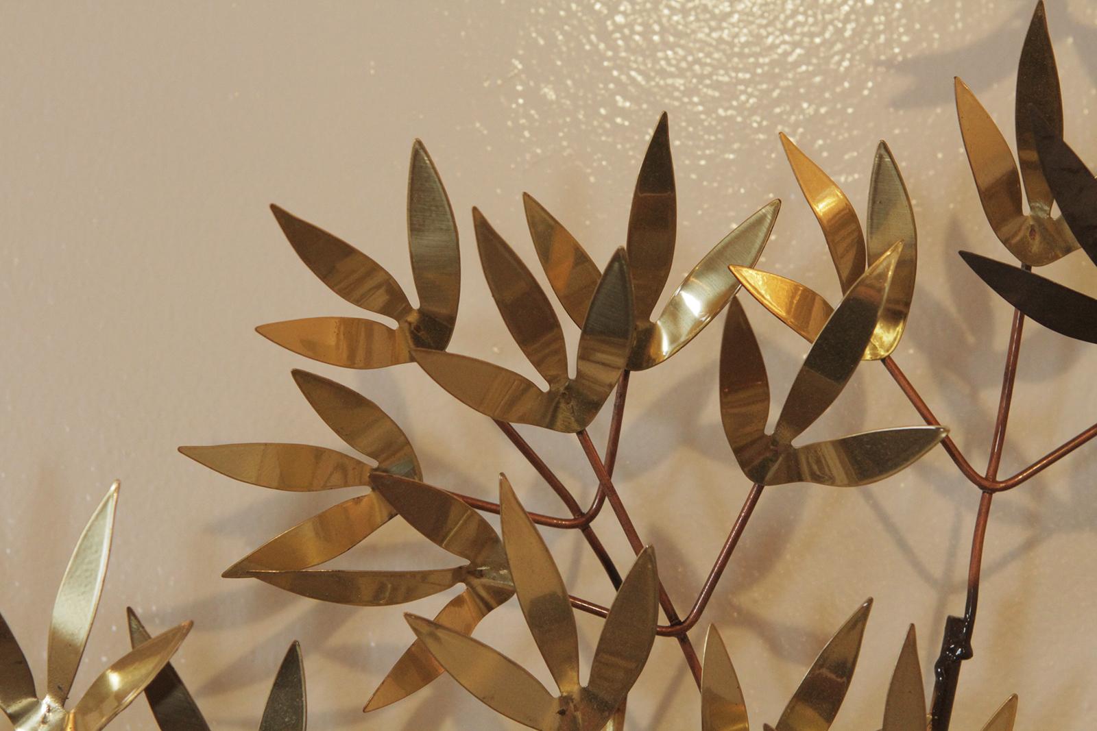 Brass wall sculpture by Curtis Jere. Signed and dated 1983. Cascades of leaves flow seamlessly to create windswept branches. Can be hung vertical or horizontal.