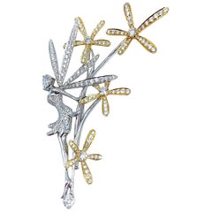 Broche fantaisiste en forme de fée en or blanc et jaune 18 carats avec diamants