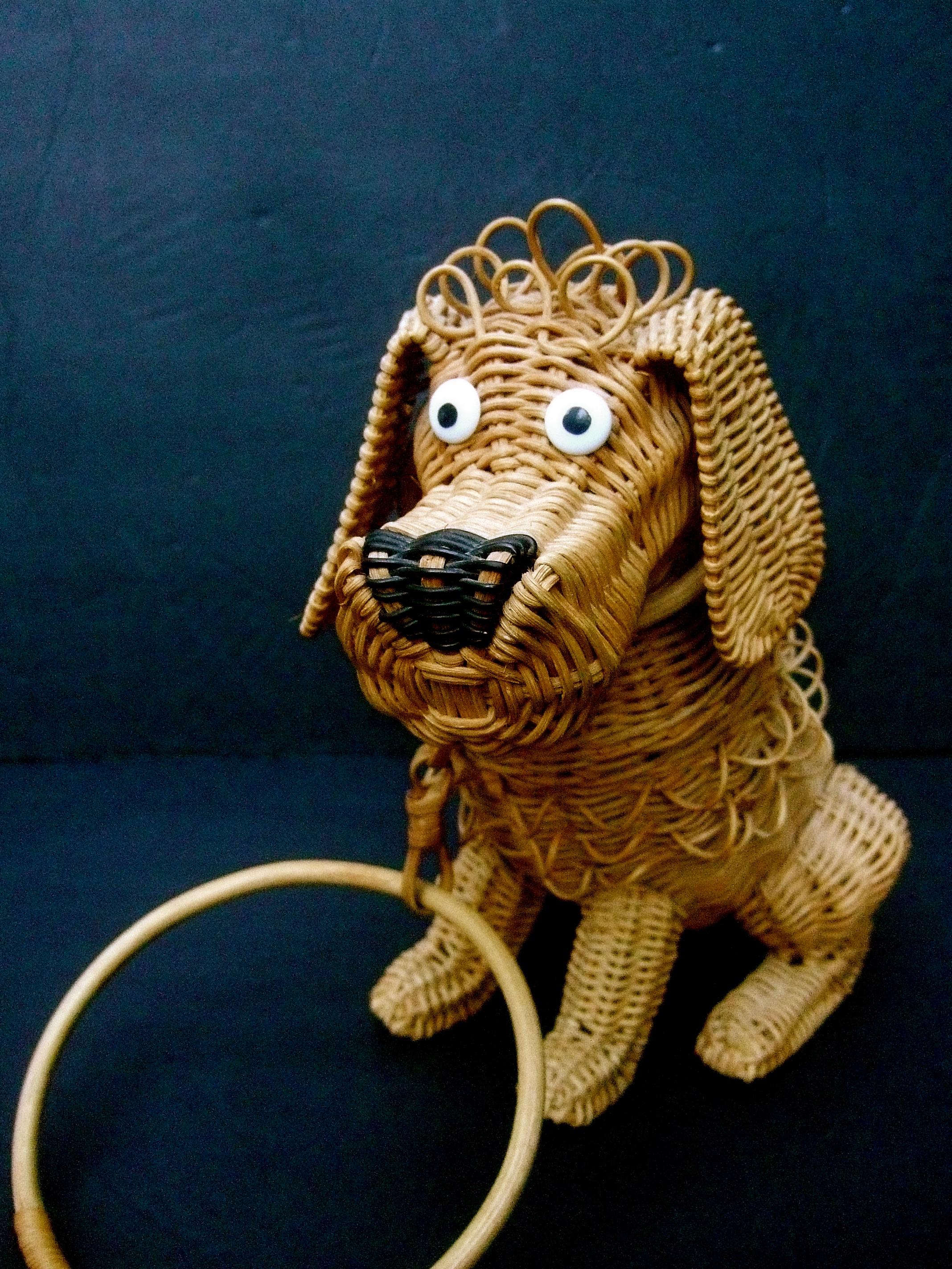 Whimsical extremely rare handmade artisan canine handbag c 1950s
The quirky retro handbag is designed in the shape of an endearing pooch
His face is distinguished with curious resin button eyes

Designed with floppy wicker ears and the top of his
