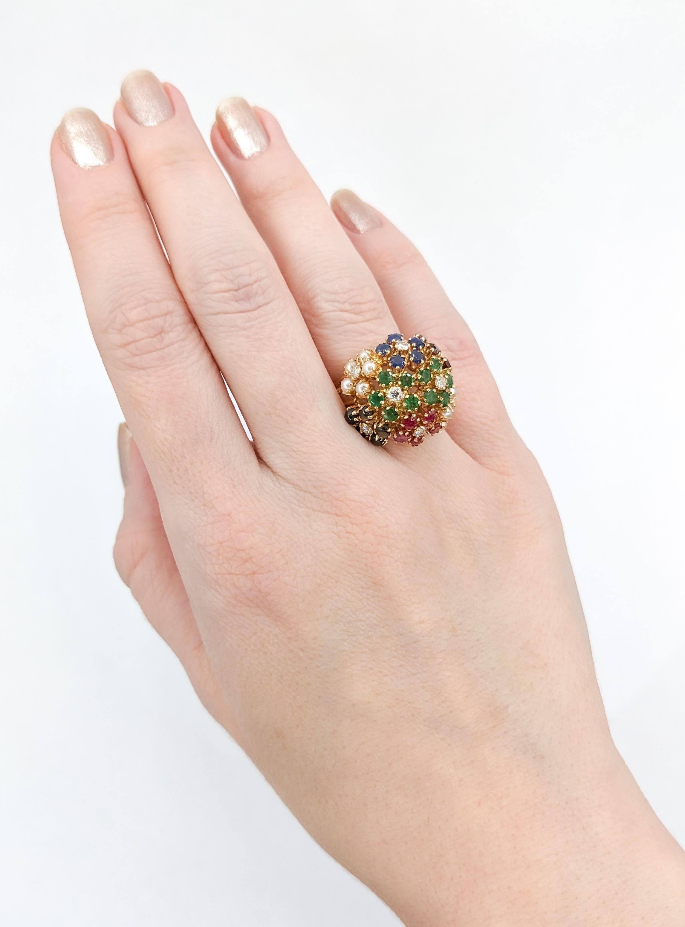 Whimsical Multi-stone Flower Cluster Ring with Diamonds, Rubies, Pearls & Emeralds in 14K Gold

Immerse yourself in the allure of this vintage floral multi-gem cluster ring. Expertly crafted in the radiant warmth of 14k Yellow Gold, this masterpiece