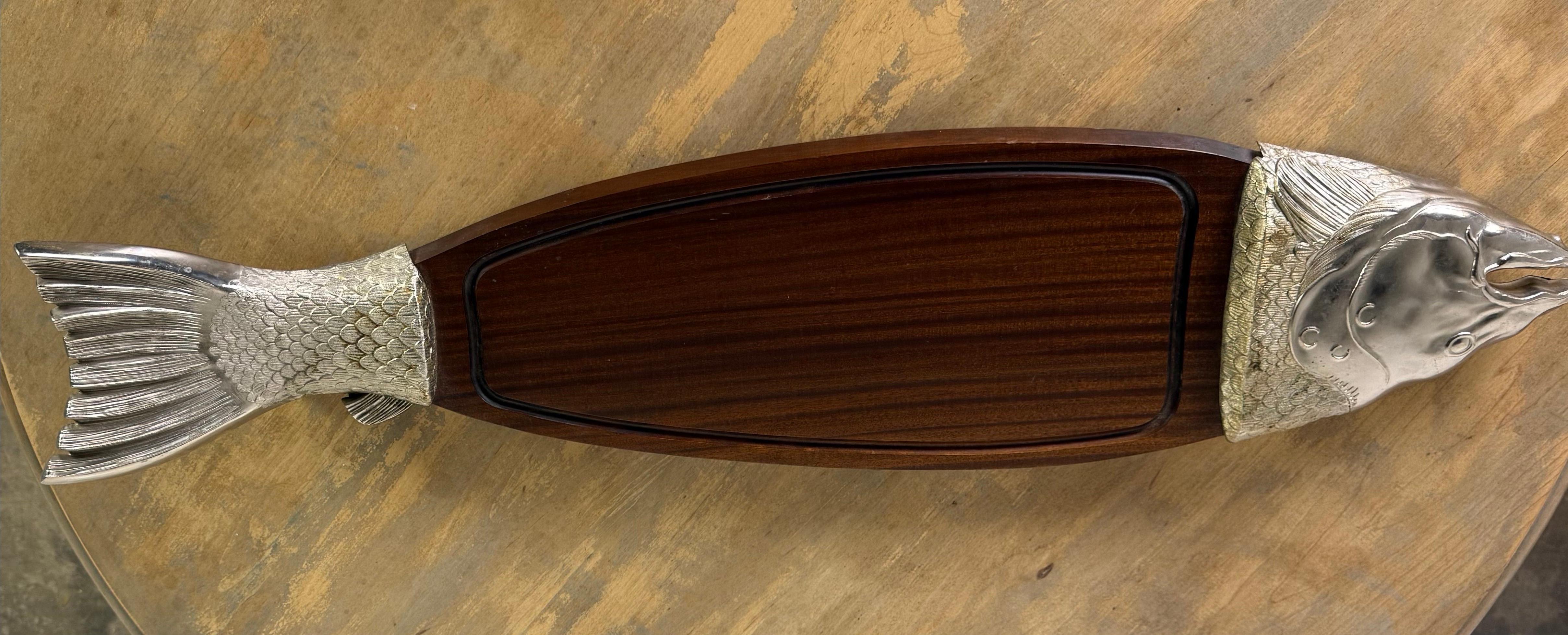 This is a striking and whimsical fish-shaped serving piece, crafted in France, as indicated by the hallmark stamped into the metal. The platter itself is a combination of richly toned wood and sculpted metal elements. The body of the fish forms the