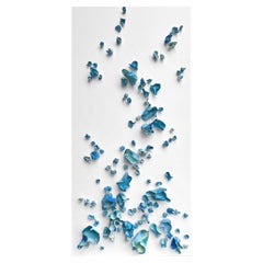 Whimsical Impermanence, blue #2. Clay Wall sculpture on canvas.