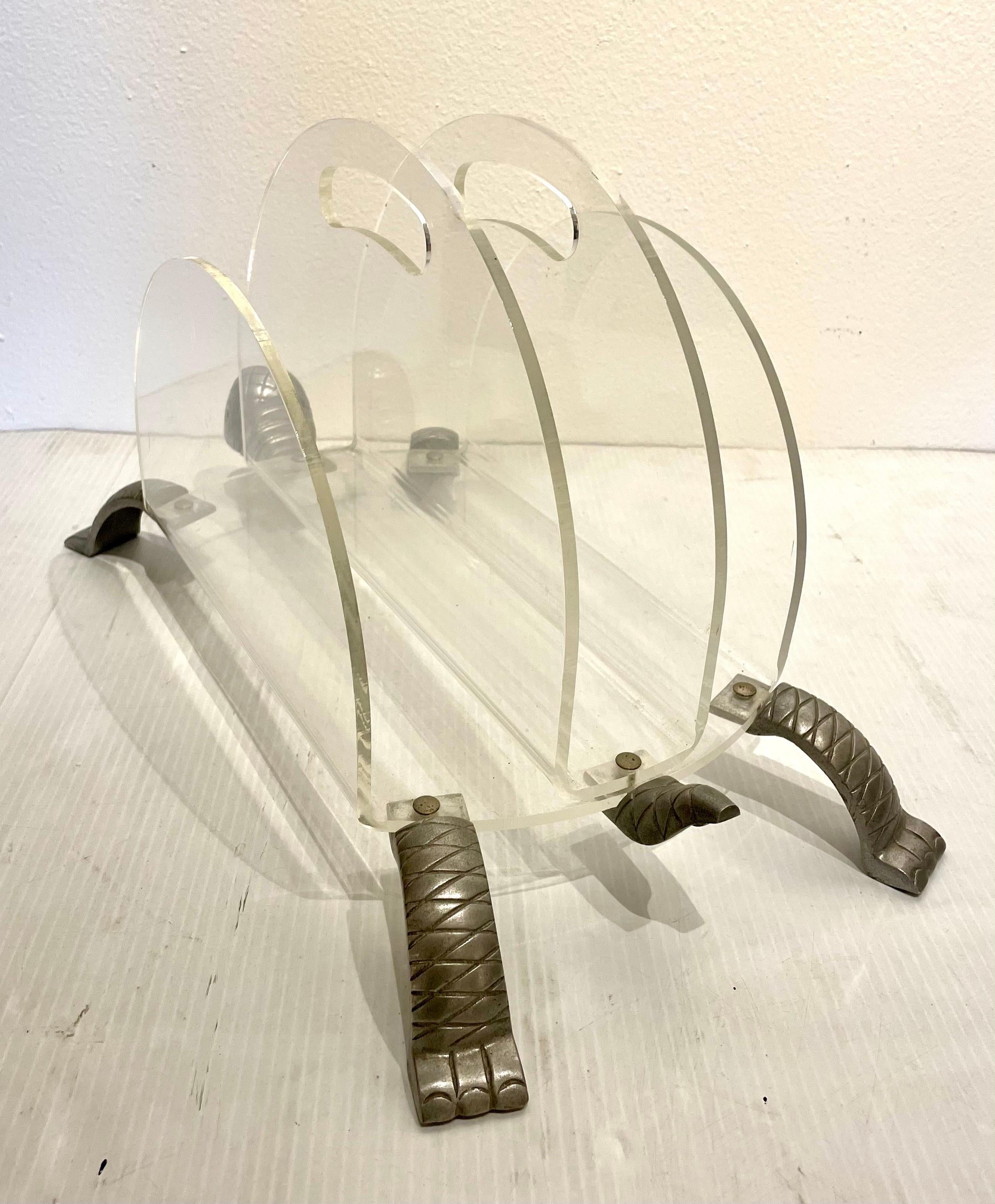 Whimsical lucite and aluminum magazine rack designed by Arthur Court, a great piece of conversation.