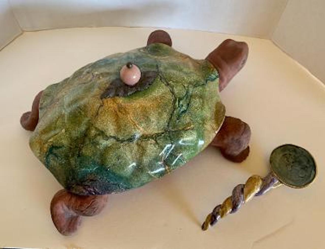 Very whimsical and imaginative, handmade and hand painted designer Mackenzie-Child’s richly textured and handsomely hand painted Majolica or earthenware three-piece turtle tureen style server with unique spoon that doubles as the turtle’s tail. The