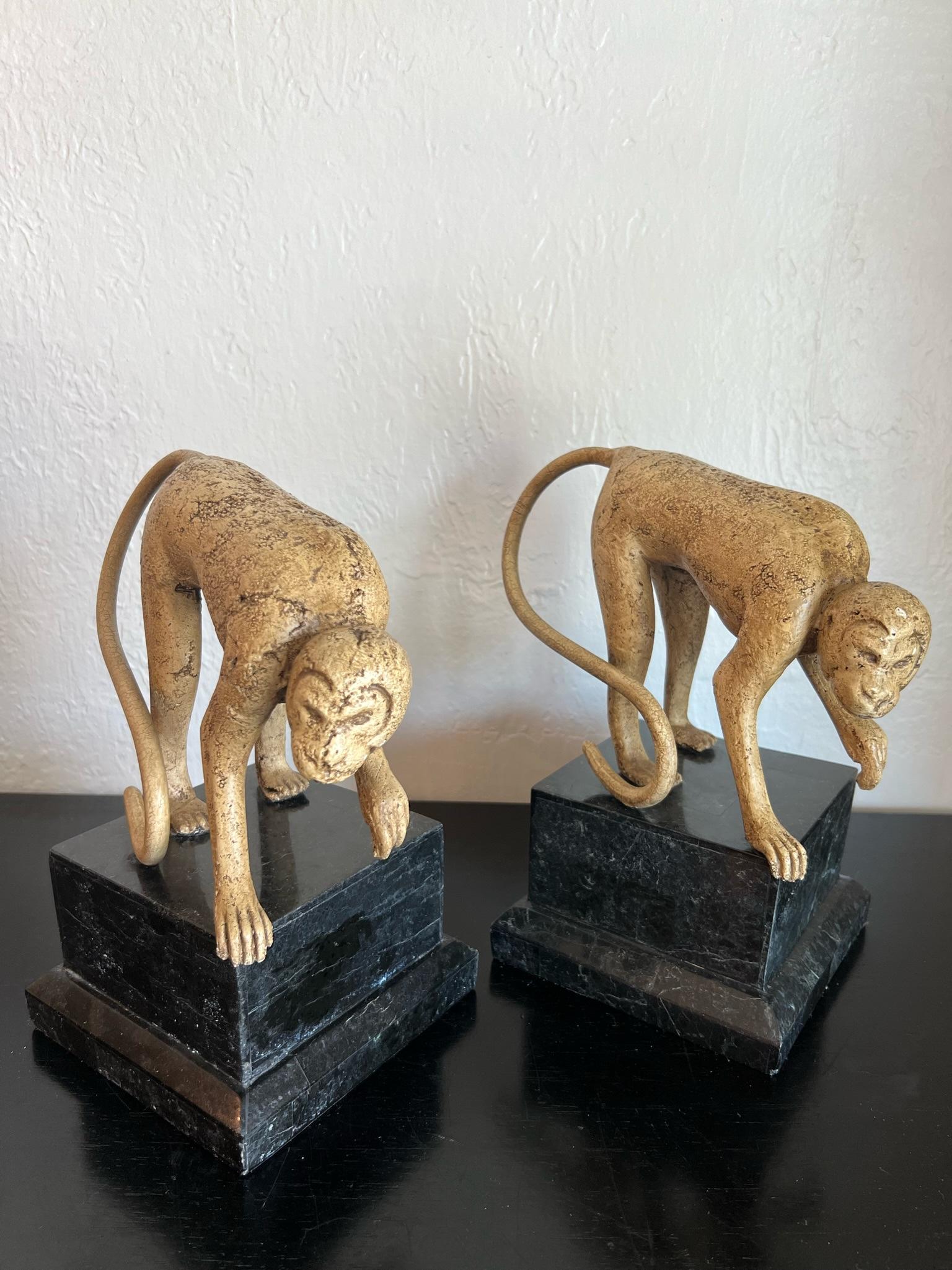 Set 3 whimsical monkey sculptures on tessellated stone bases. 
Sizes are as follows:
Two Smaller Monkeys: 10.5