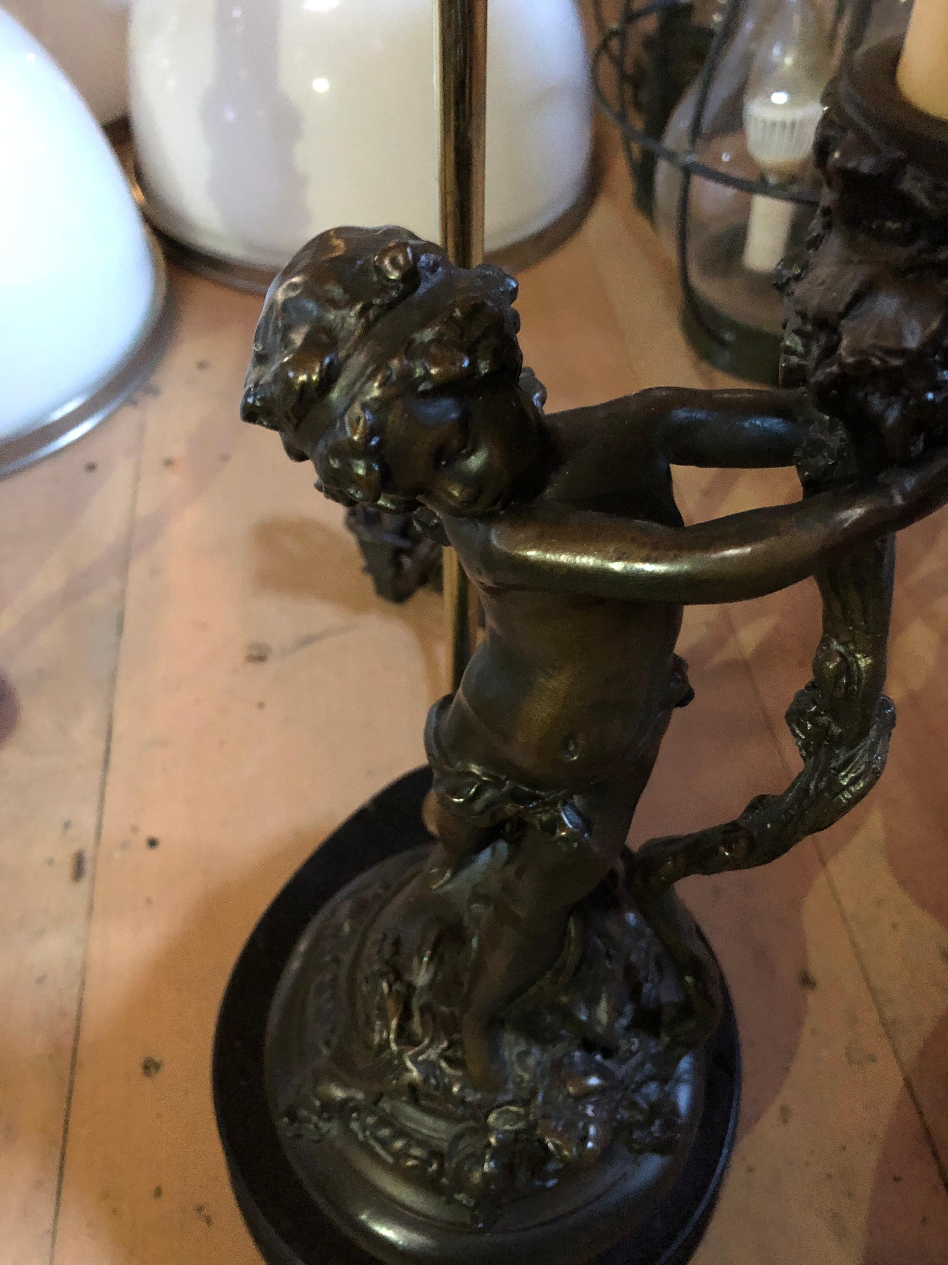 Whimsical Pair of Bronze Finish Cherub Table Lamps In Good Condition For Sale In Hopewell, NJ