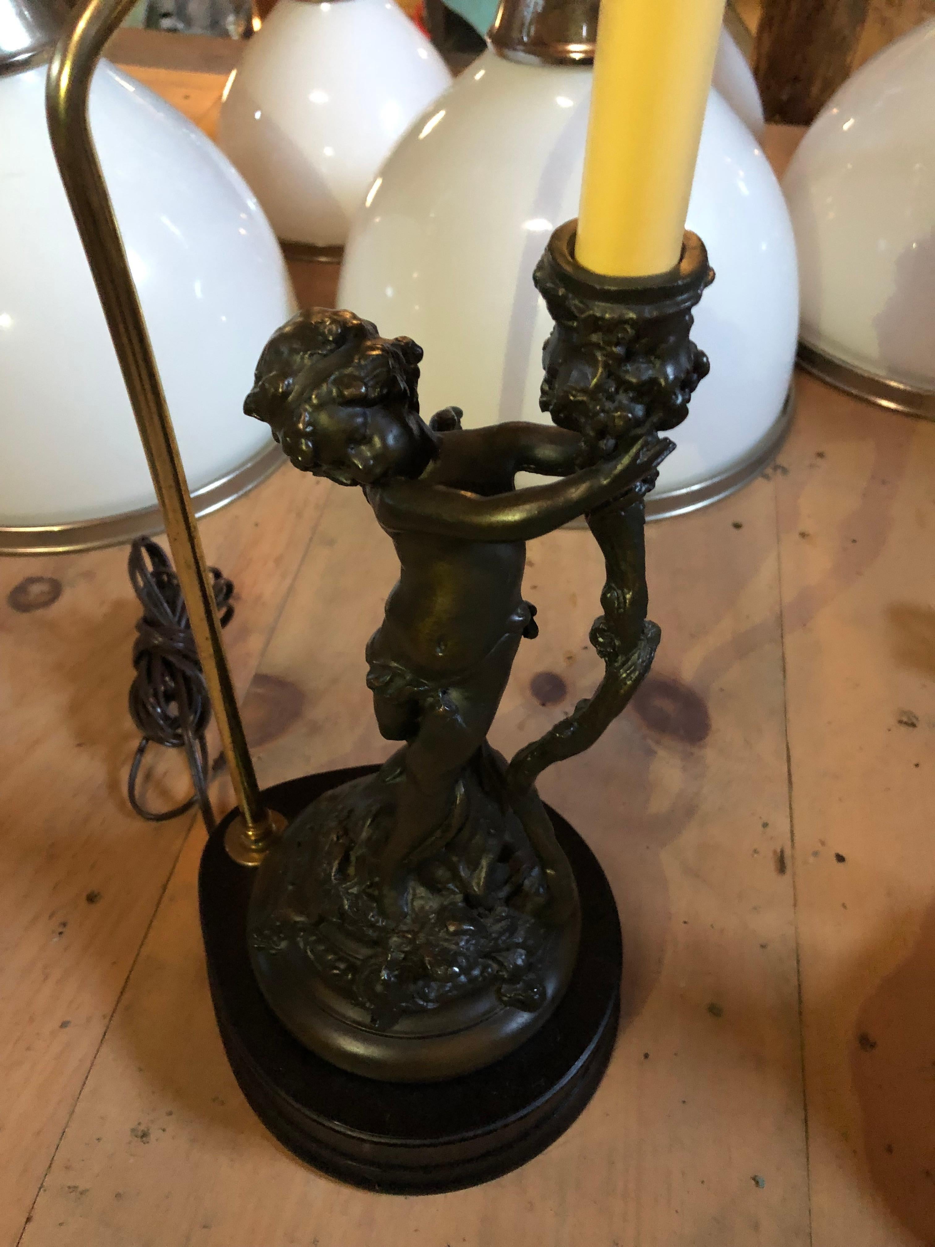 Metal Whimsical Pair of Bronze Finish Cherub Table Lamps For Sale