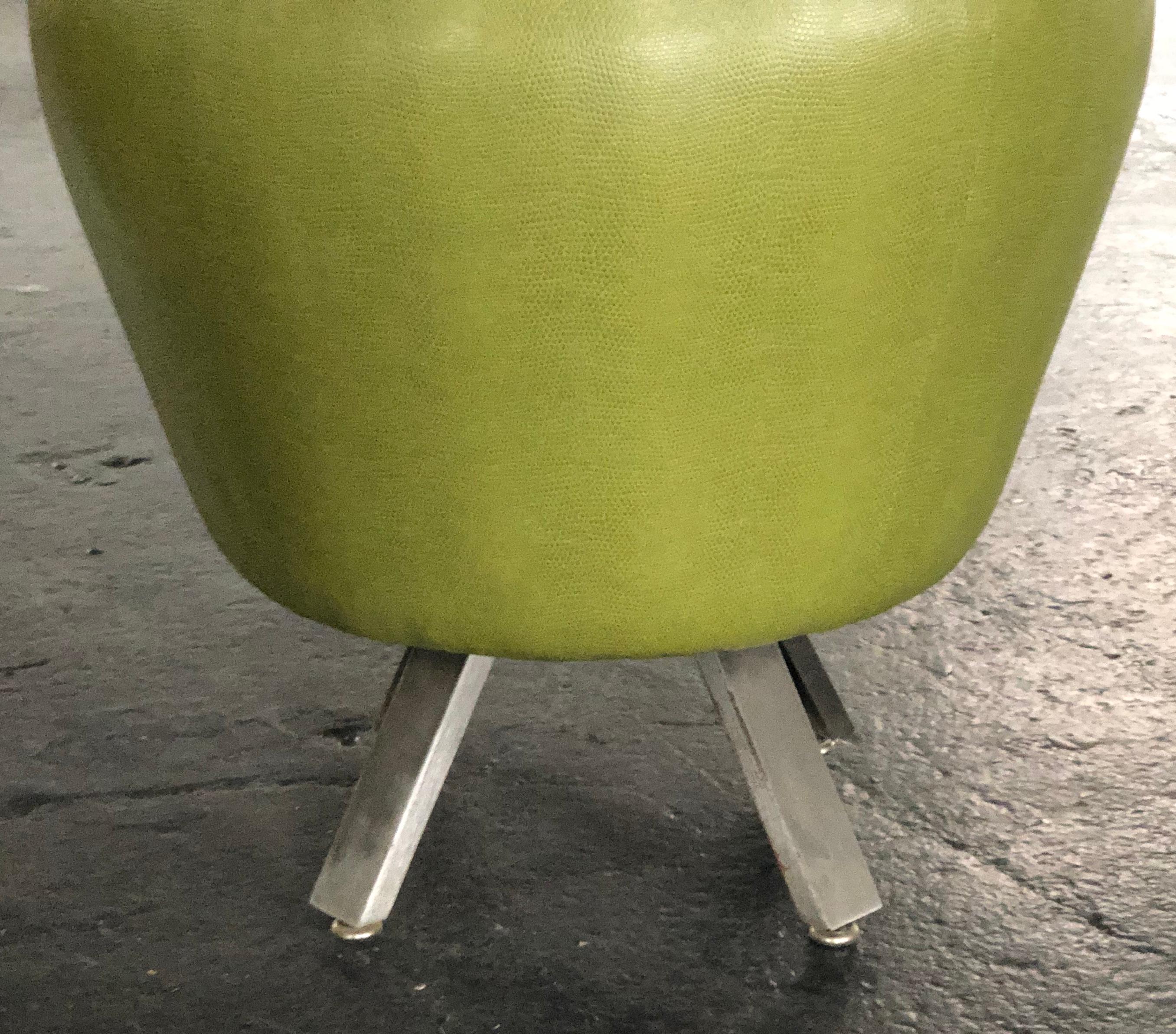 This unique pair of custom stools are upholstered in a Pea Green 