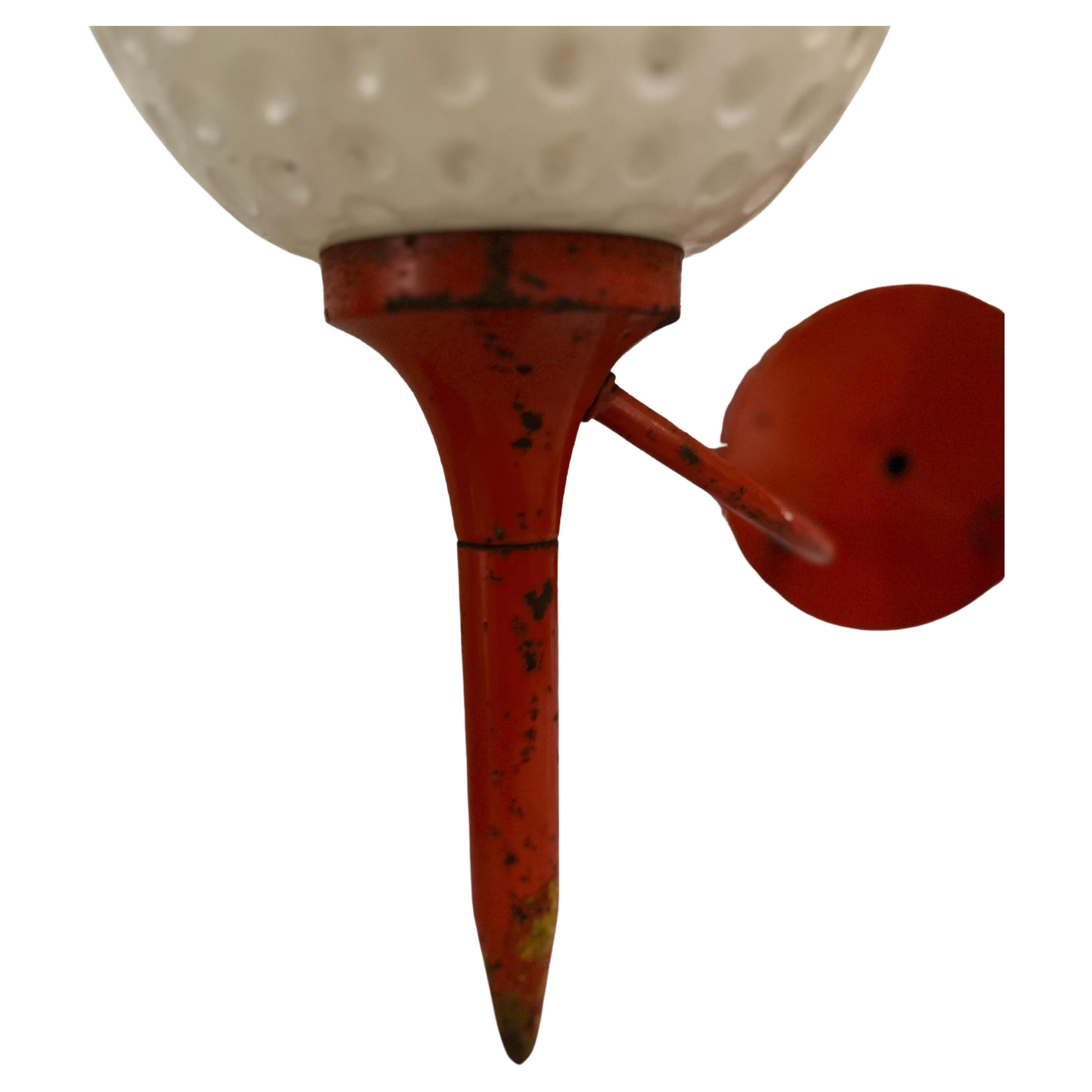 Whimsical and very rare 1970's glass golf ball lampshades sitting on a metal frame patinated tees, great gift for the golf enthusiast or a mancave very unique in working condition that needs to be hardwired, it can also be repainted but we left it