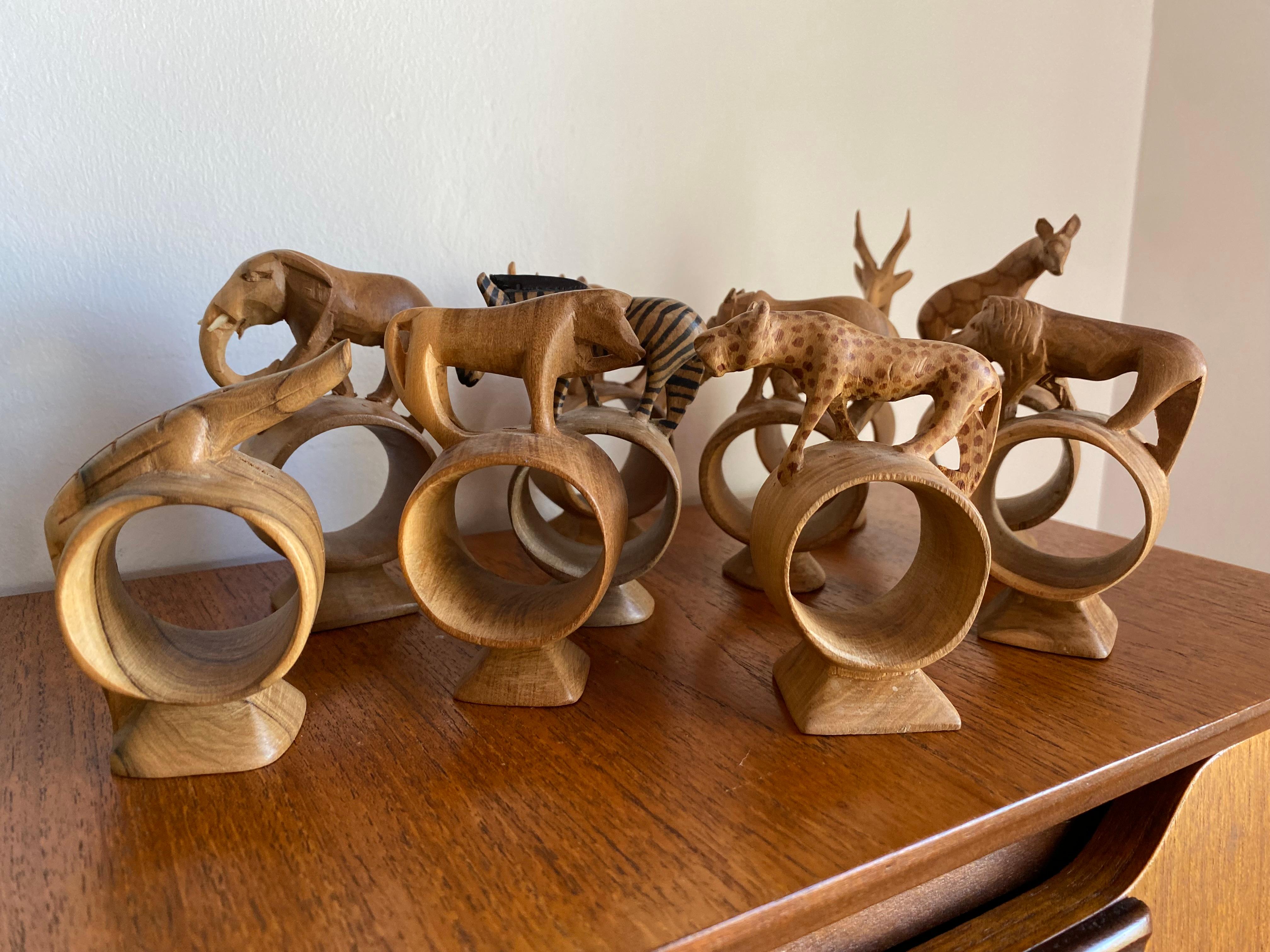 Bohemian Whimsical Set of 10 Hand Carved African Mix Woods Animals Napkin Ring Holders For Sale