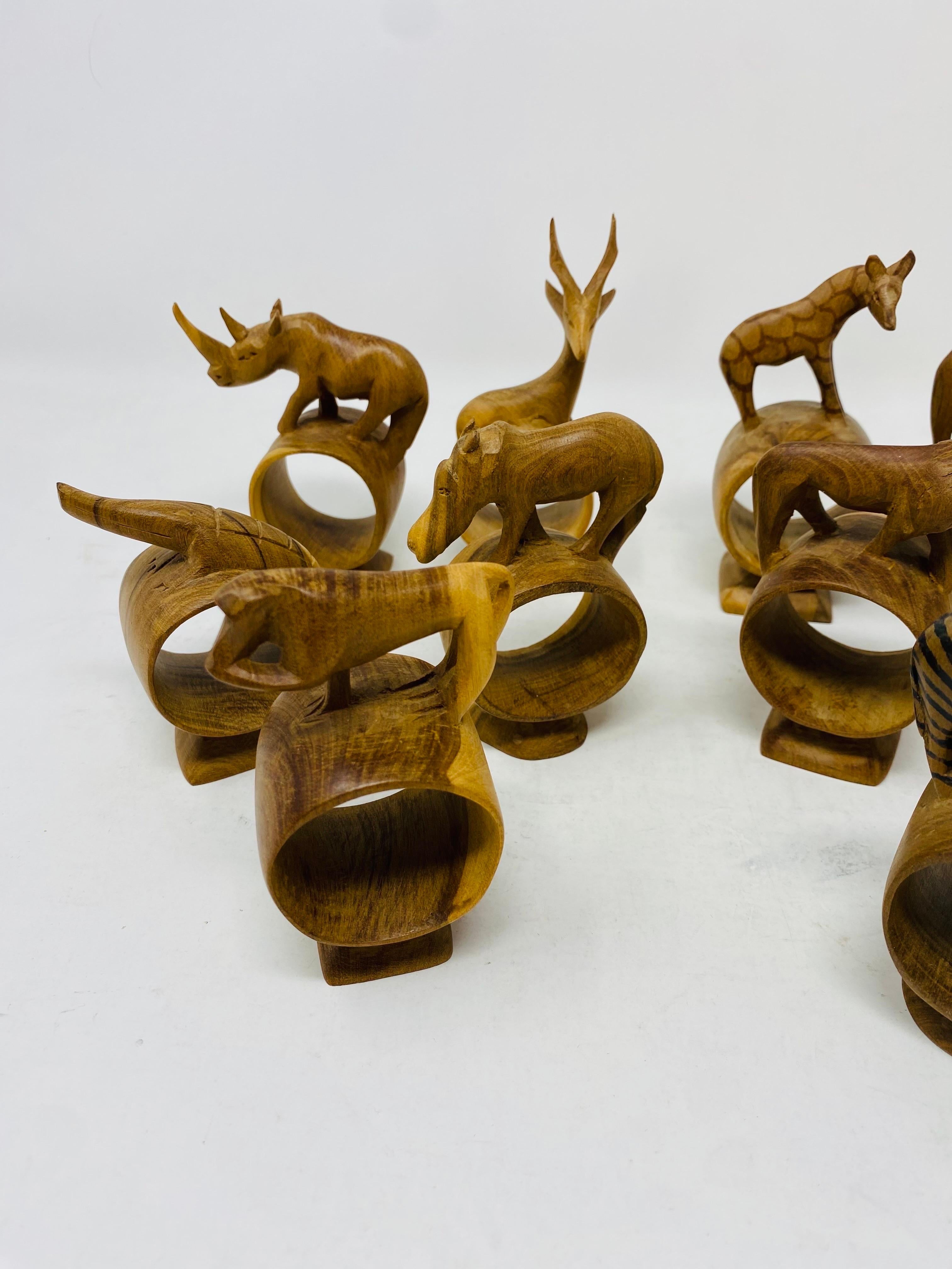 Whimsical Set of 10 Hand Carved African Mix Woods Animals Napkin Ring Holders In Good Condition For Sale In San Diego, CA