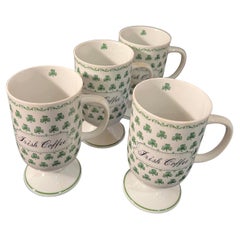 Whimsical set of 4 Irish Coffee Footed Porcelain Mugs Shamrocks 1970's
