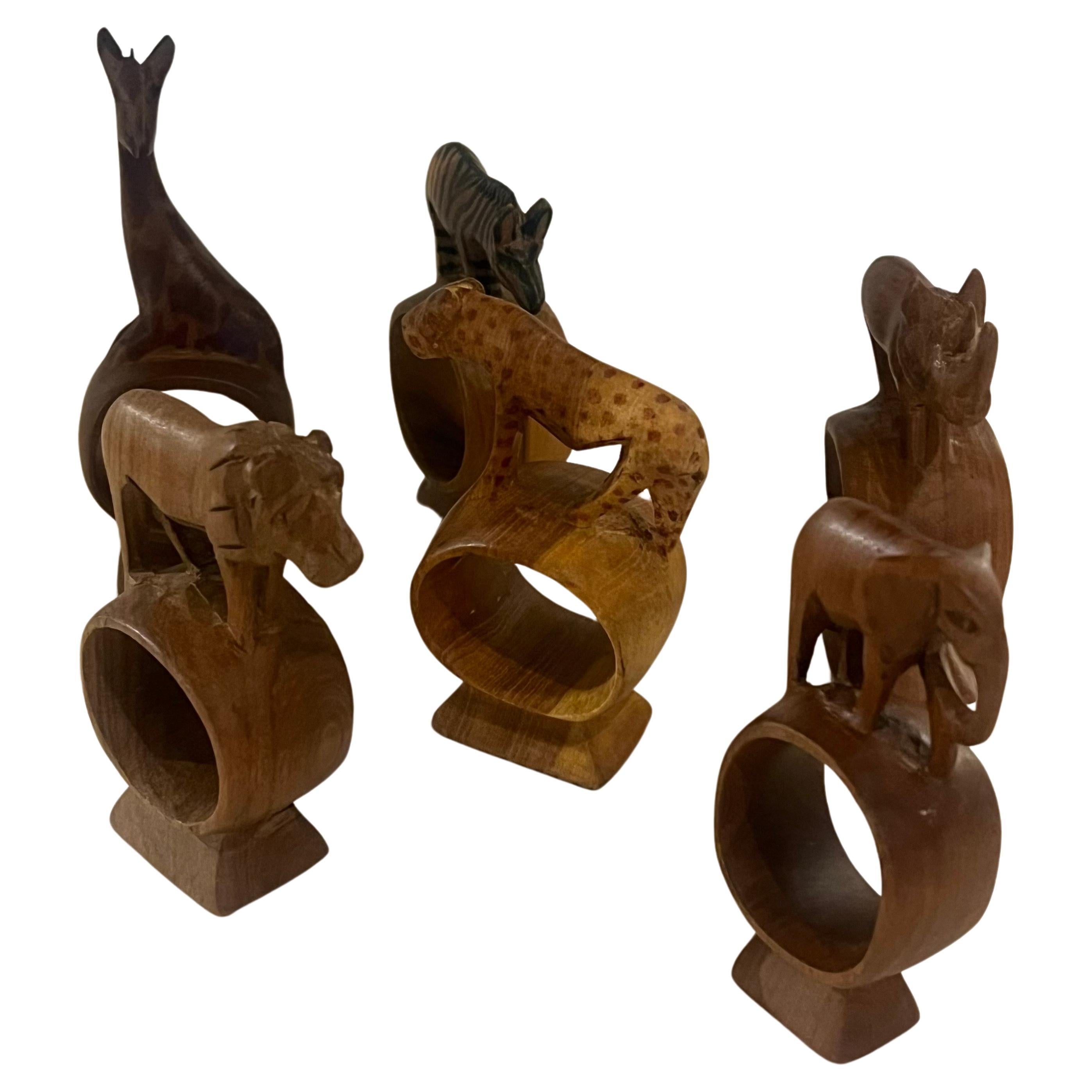 Whimsical Set of 6 Hand Carved African Mix Woods Animals Napkin Ring Holders , circa 1970's walnut , maple etc mahogany.
