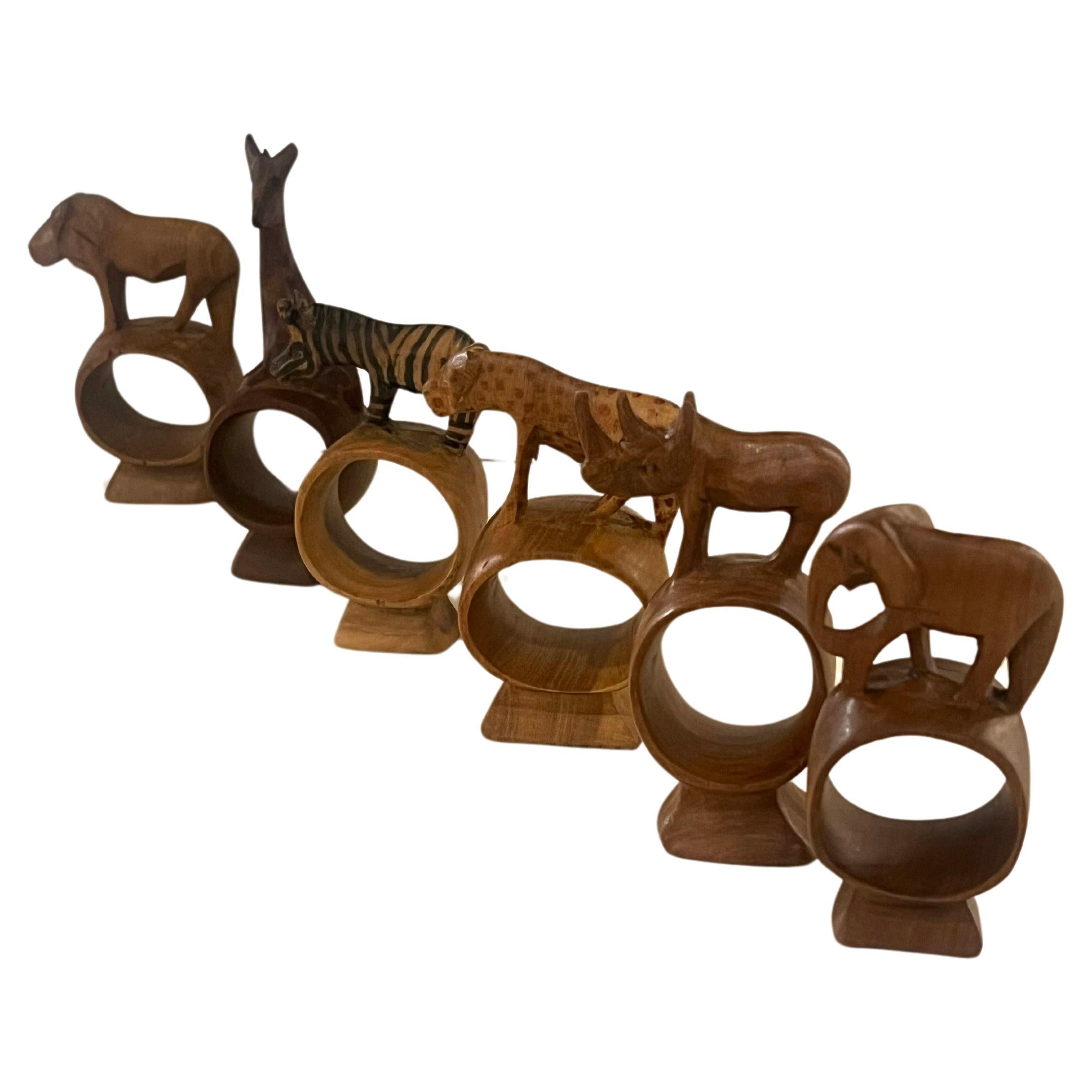 Bohemian Whimsical Set of 6 Hand Carved African Mix Woods Animals Napkin Ring Holders For Sale