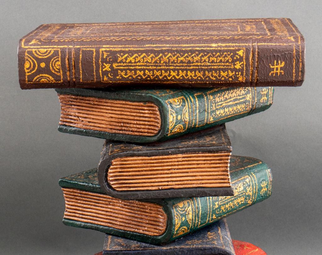 Whimsical side table of a stack of classical books, resin, unmarked. In good vintage condition.

Dealer: S138XX.
