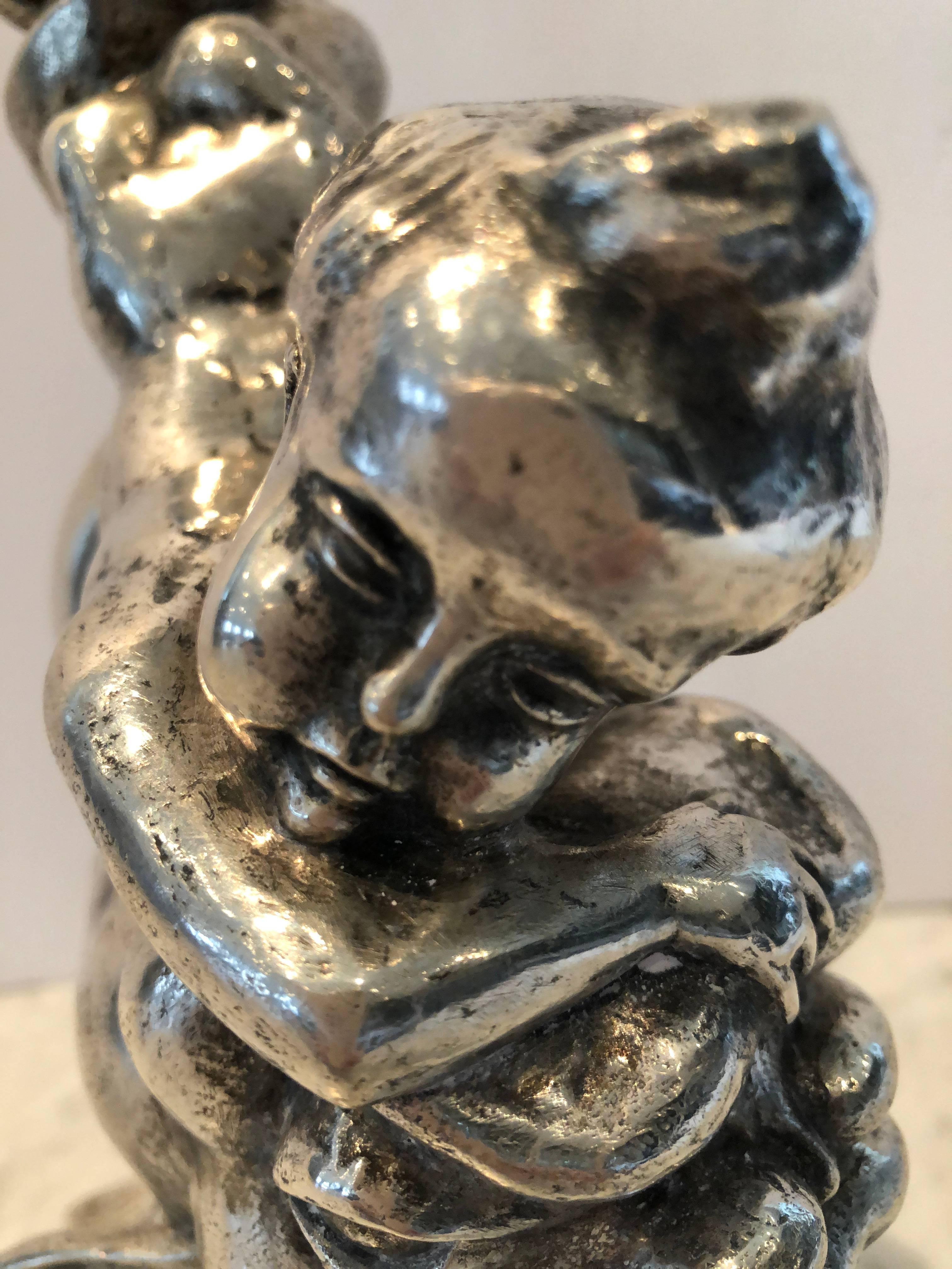 Américain Sculpture fantaisiste d'un chérubin en métal argenté