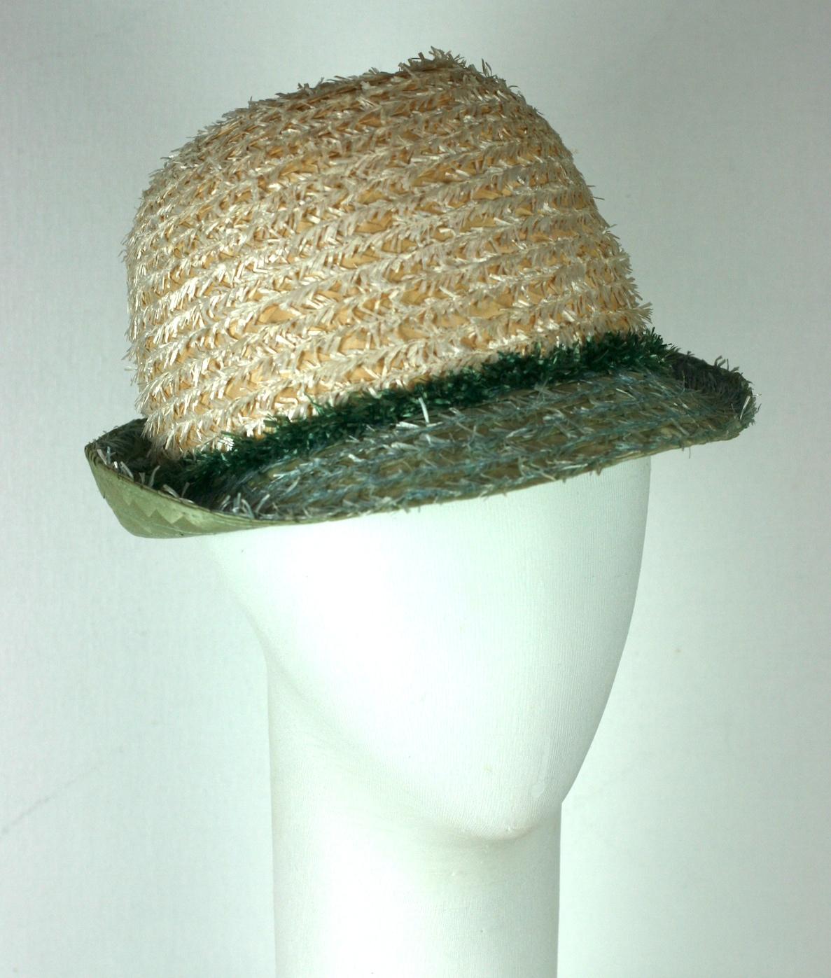 Kleinerts whimsical straw fedora of white and aqua raffia chenille on a natural straw ground, appliqued with an abstract hand cut felt sailboat and hovering seagulls. 1950's Imported. 
Excellent Condition.   Label 