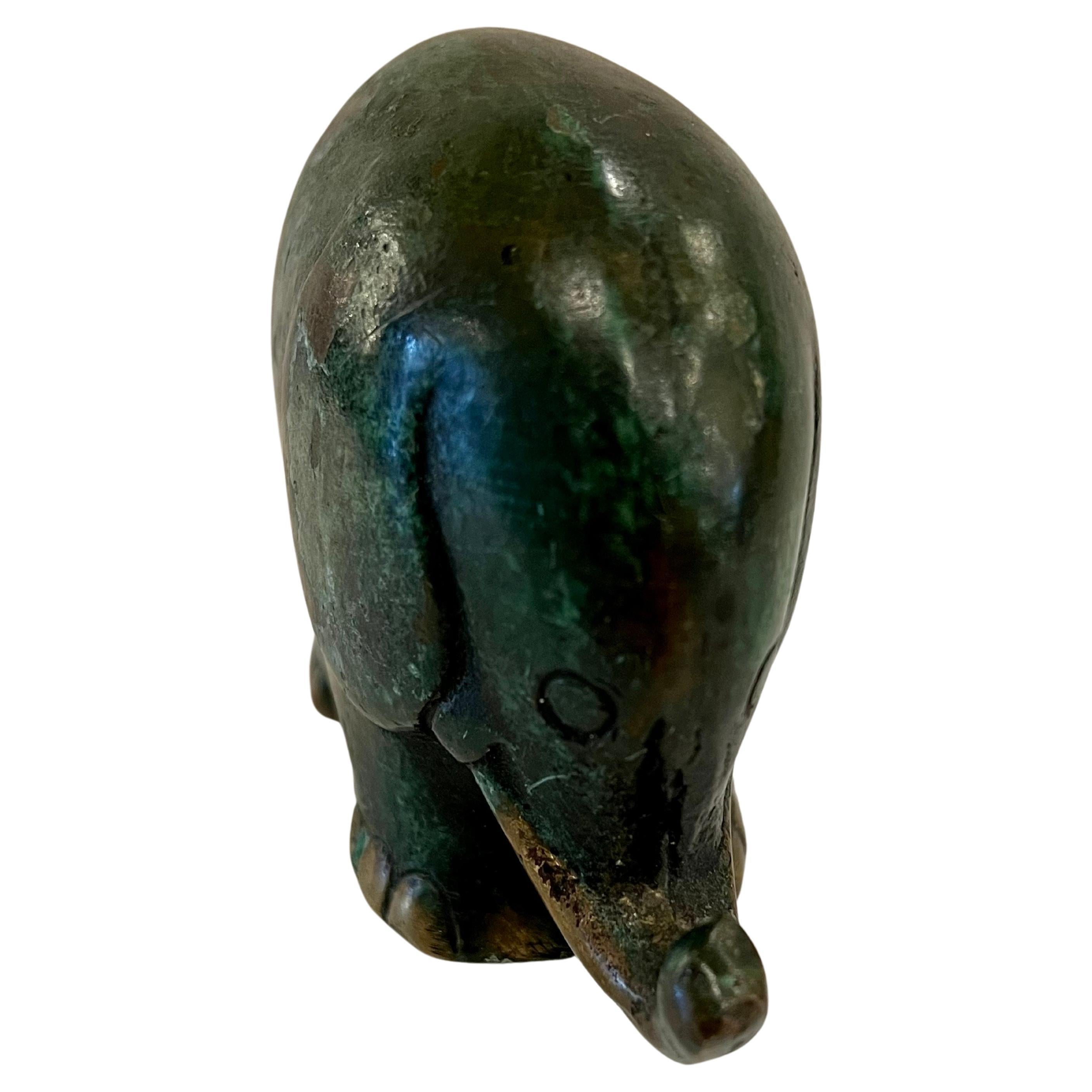 Whimsical Brass cast elephant in a verdigris finish, circa 1970s beautiful and sign of good luck.