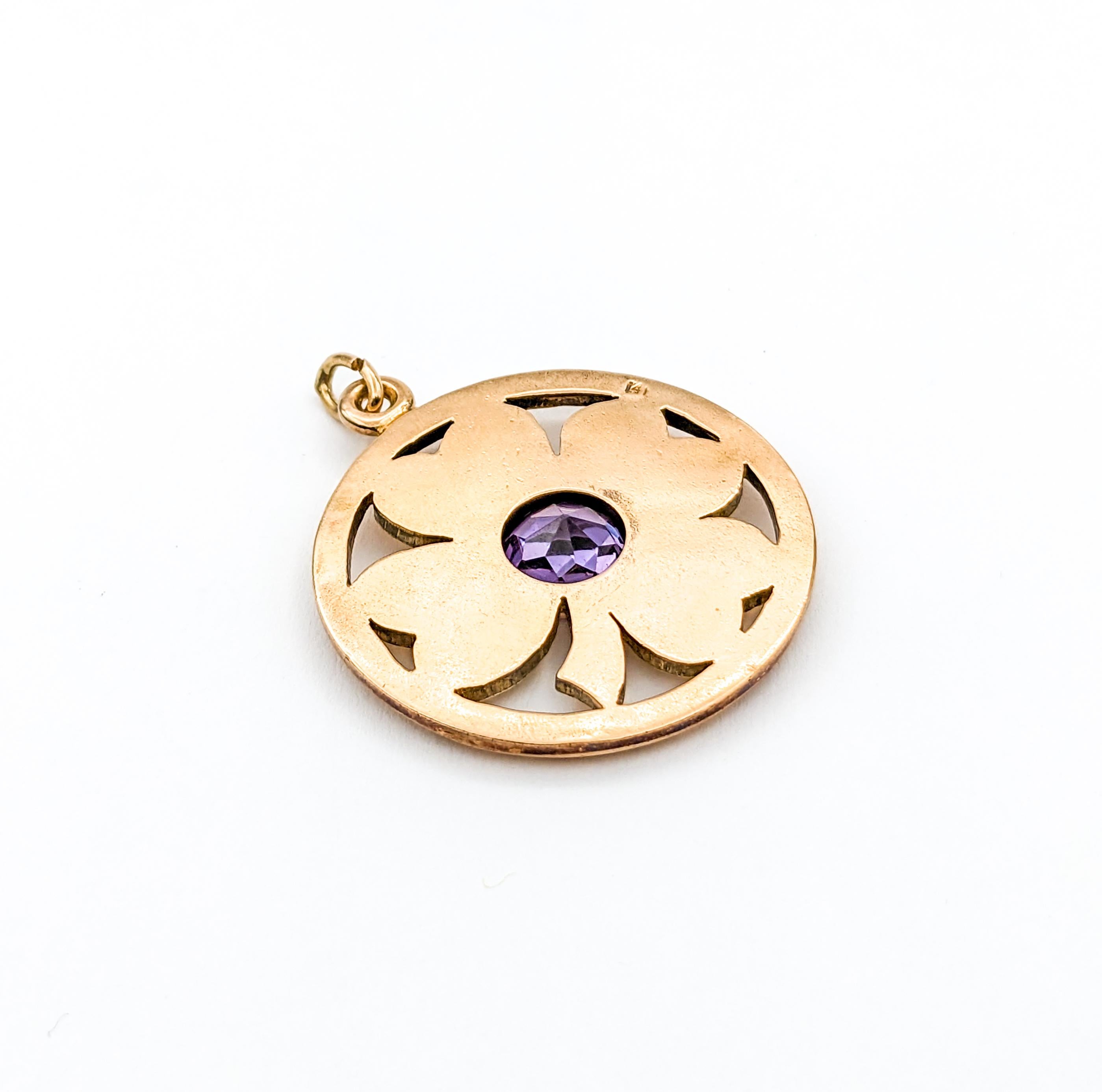 Whimsical Vintage Shamrock Lab Alexandrite Pendant in 14K Gold

Fall in love with this whimsical vintage clover pendant, meticulously shaped in 14k gold with a pink undertone. At its heart lies a radiant purple-blue 9mm (Estimated 2.25ct) Lab