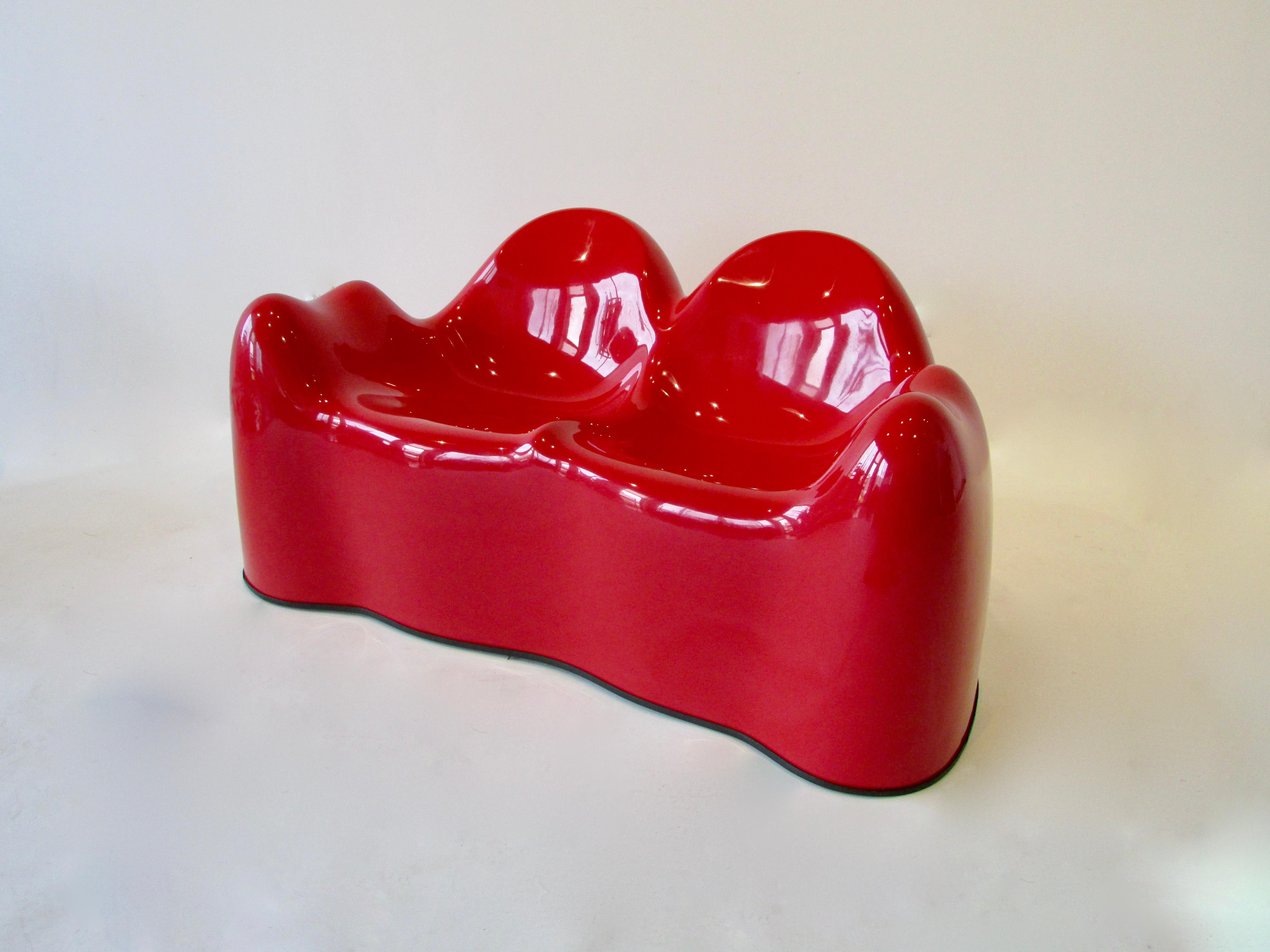 Whimsical organic form molded of fiberglass in a stylized form of molars. Designed by Wendell Castle produced by Beylerian .