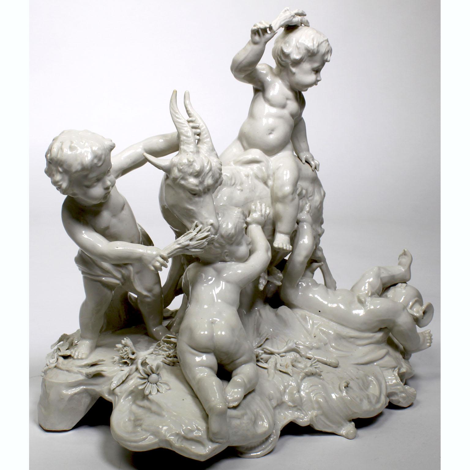 European Whimsical White Glazed Porcelain Group of Four Putti Playing with a Goat For Sale