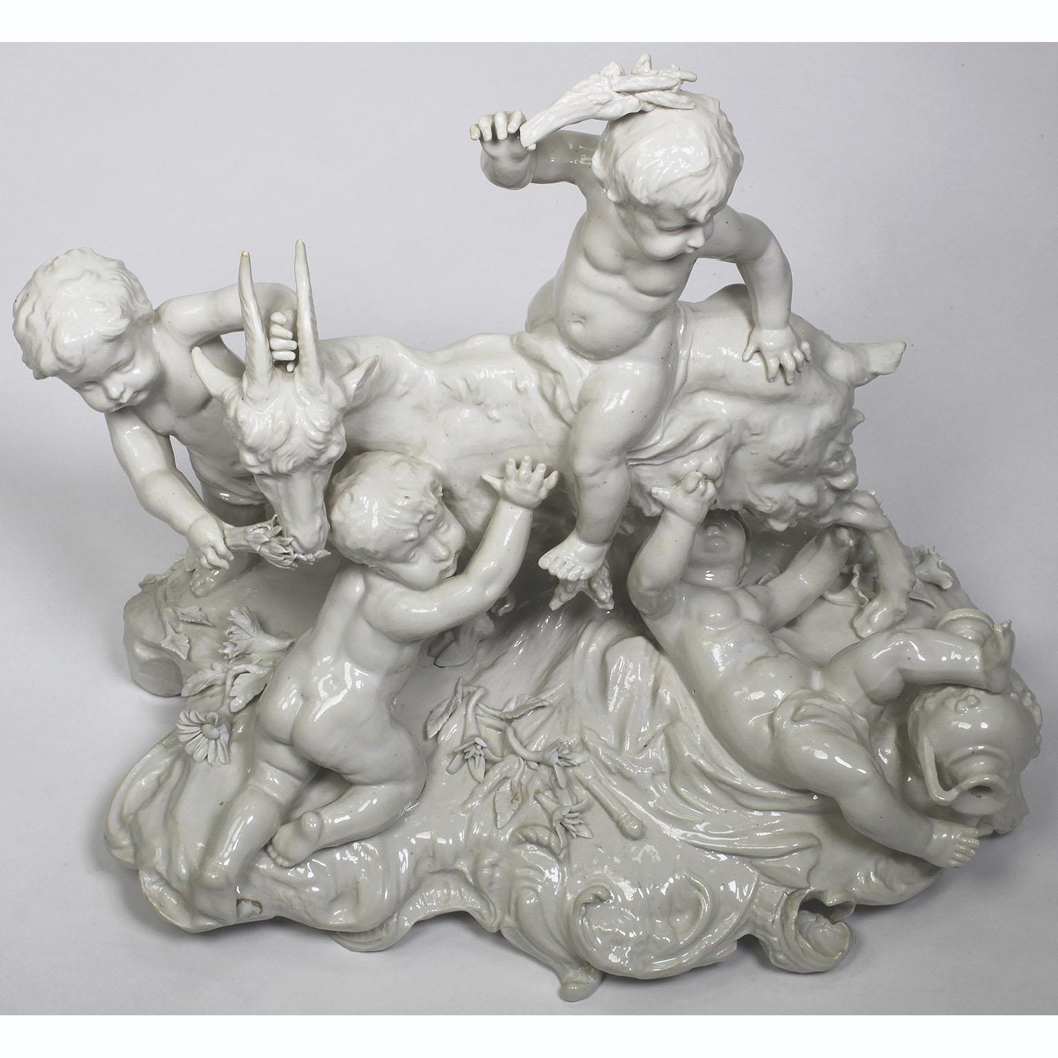 Whimsical White Glazed Porcelain Group of Four Putti Playing with a Goat In Fair Condition For Sale In Los Angeles, CA