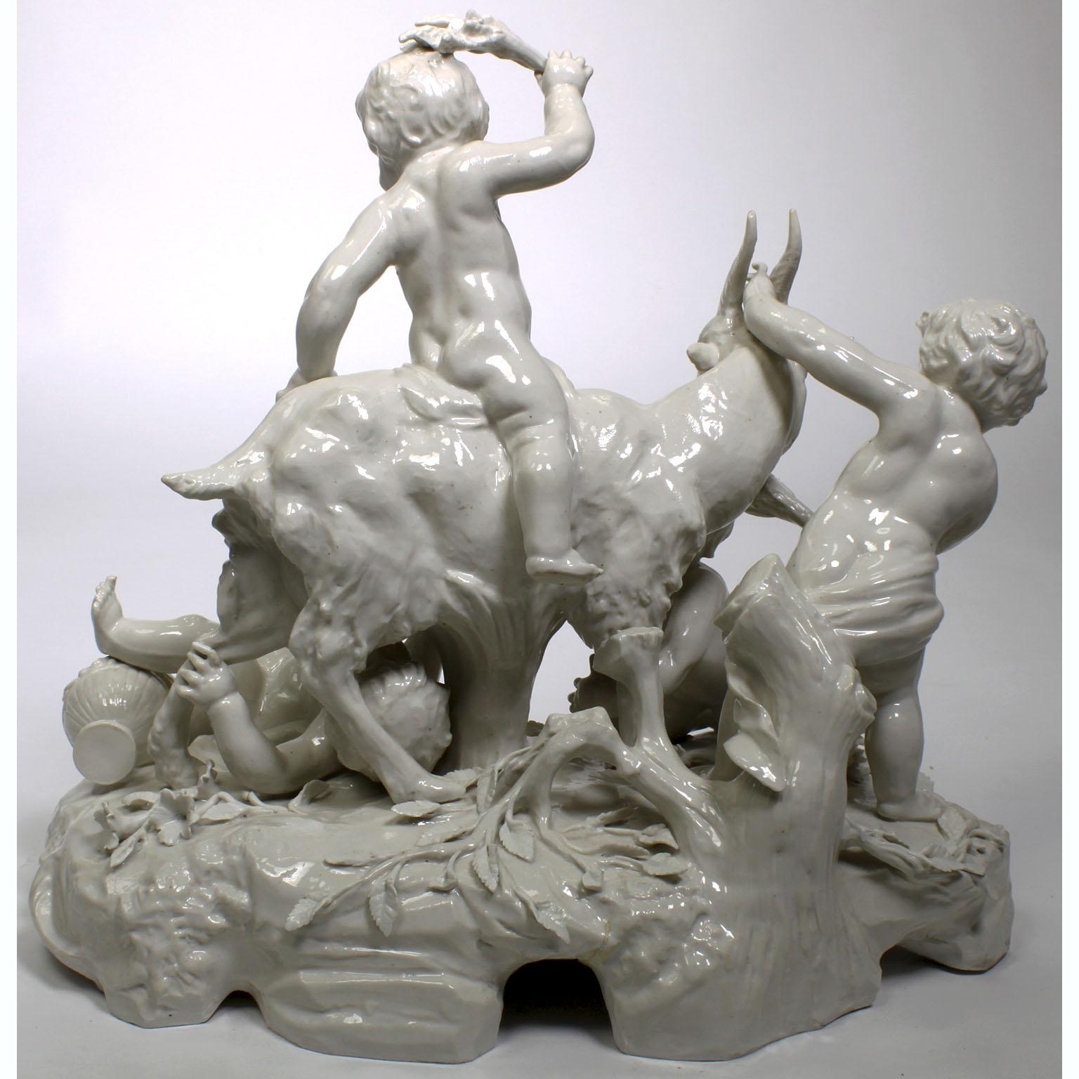 Whimsical White Glazed Porcelain Group of Four Putti Playing with a Goat For Sale 1