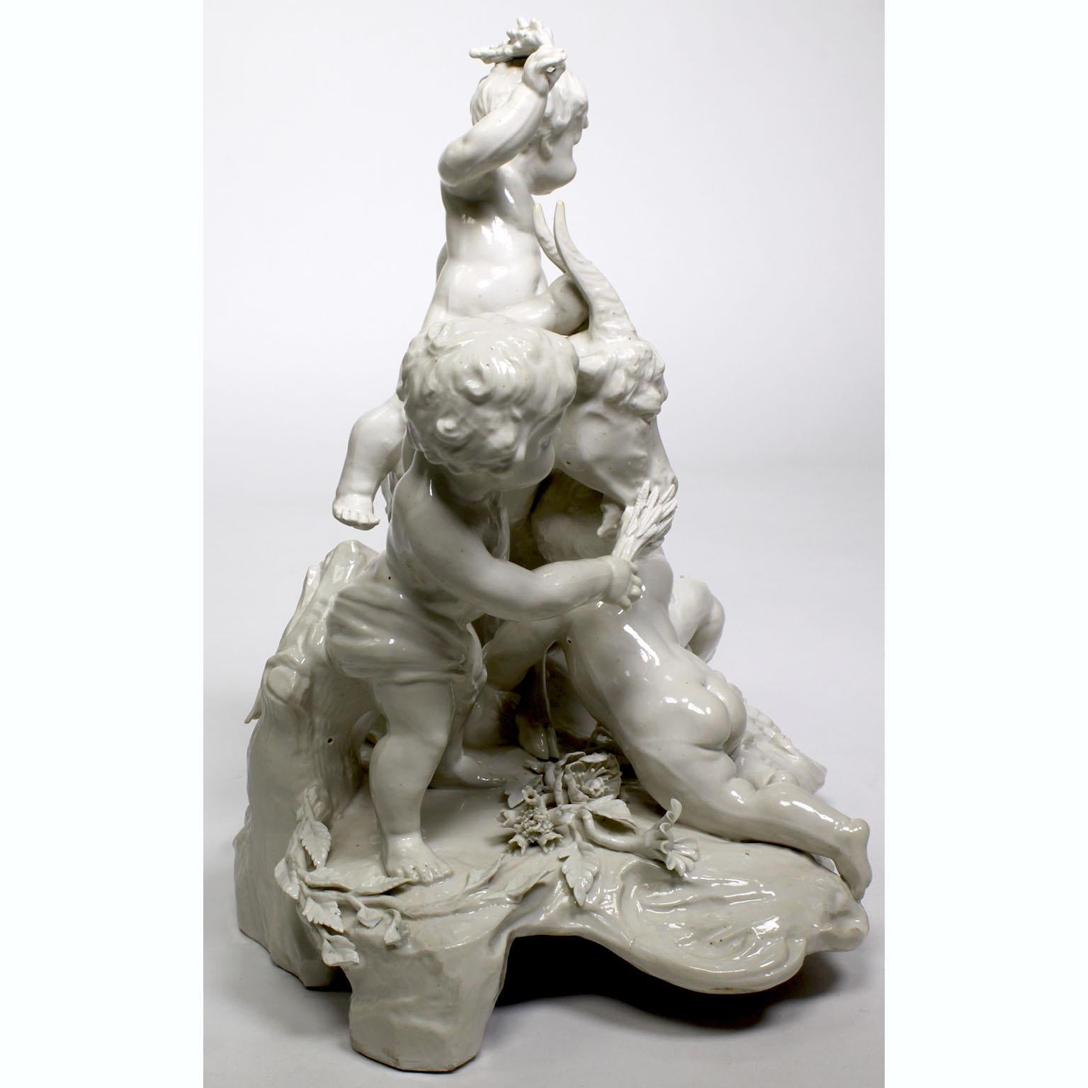 Whimsical White Glazed Porcelain Group of Four Putti Playing with a Goat For Sale 2