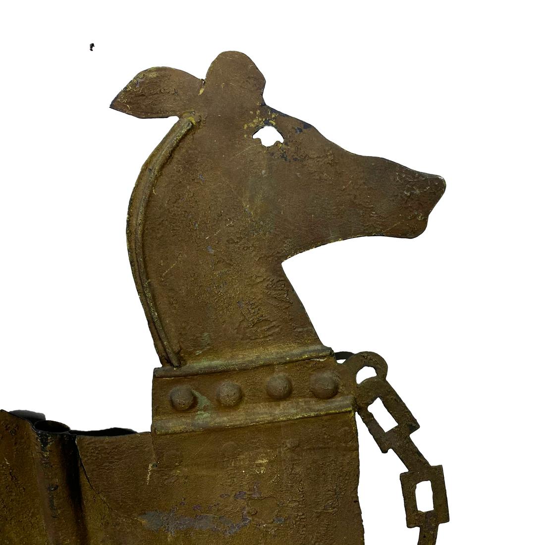 Painted sheet copper whippet weather.
A sitting whippet with ridged tail, cutout chain link style leash and riveted collar. Original brown paint
with a crazed surface, the reverse side with later black paint. The 3 ¼” diameter iron pole is mended