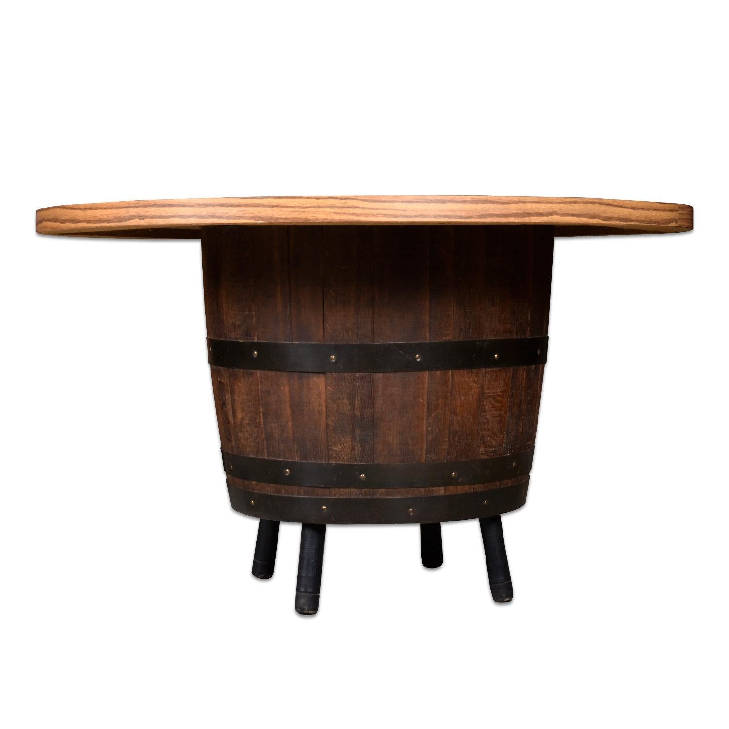 Vintage whisky barrel table made by Brothers Furniture Corp. of Livermore, Kentucky. Who knows whiskey better than Kentucky? This 47.75? round table captures the spirit of America itself, scrappy and steadfast. Made from a hearty solid oak whiskey