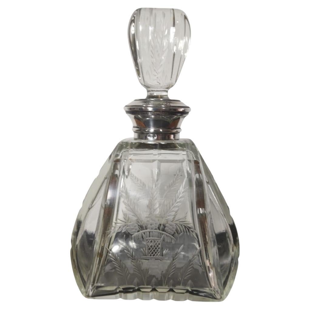 Decantador de whisky de cristal y plata