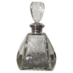 Decantador de whisky de cristal y plata