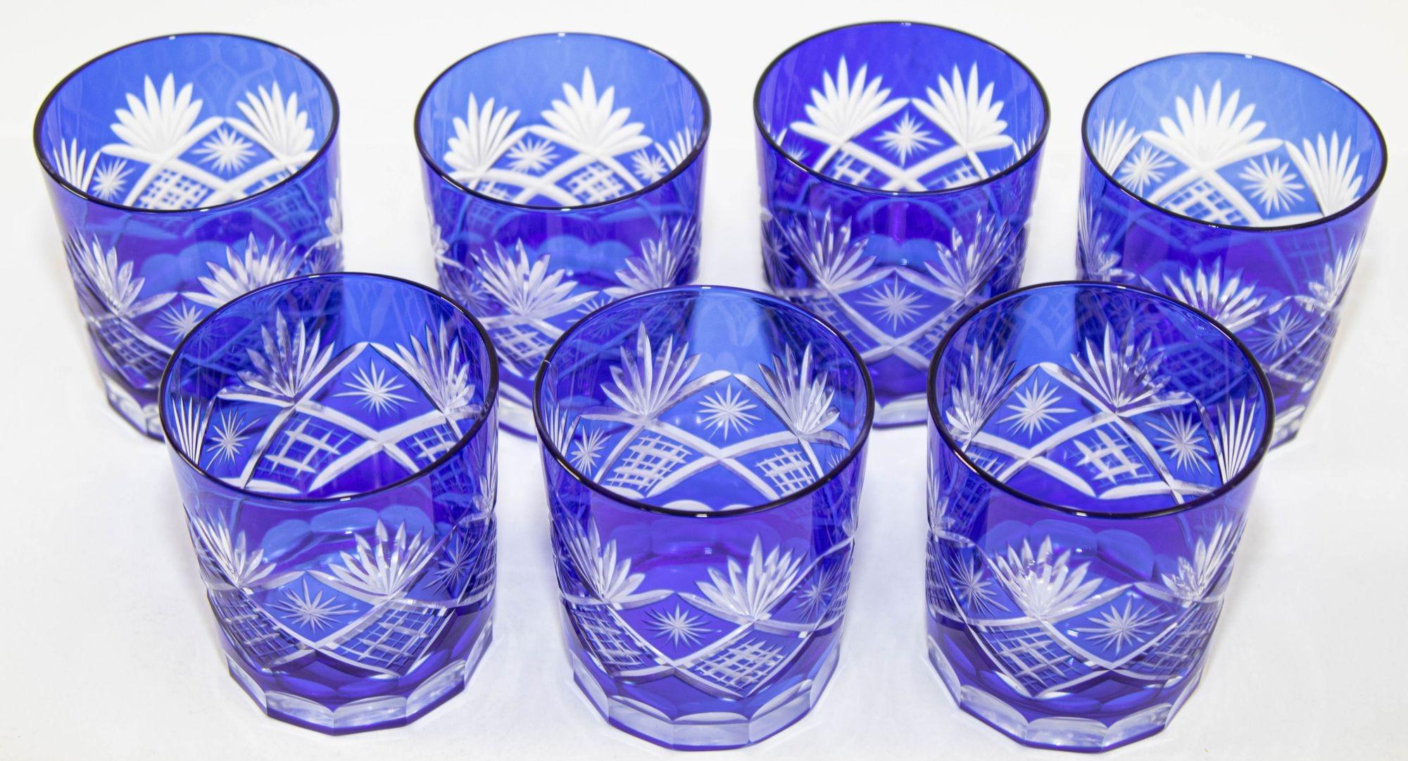Whiskey glass tumbler Baccarat sapphire blue cut crystal set of 7.
Set of seven vintage whiskey glasses tumbler cobalt blue crystal Baccarat style.
Exquisite Bohemian crystal style cut Czech drinking rock glasses.
The vibrant hand blown rich jewel