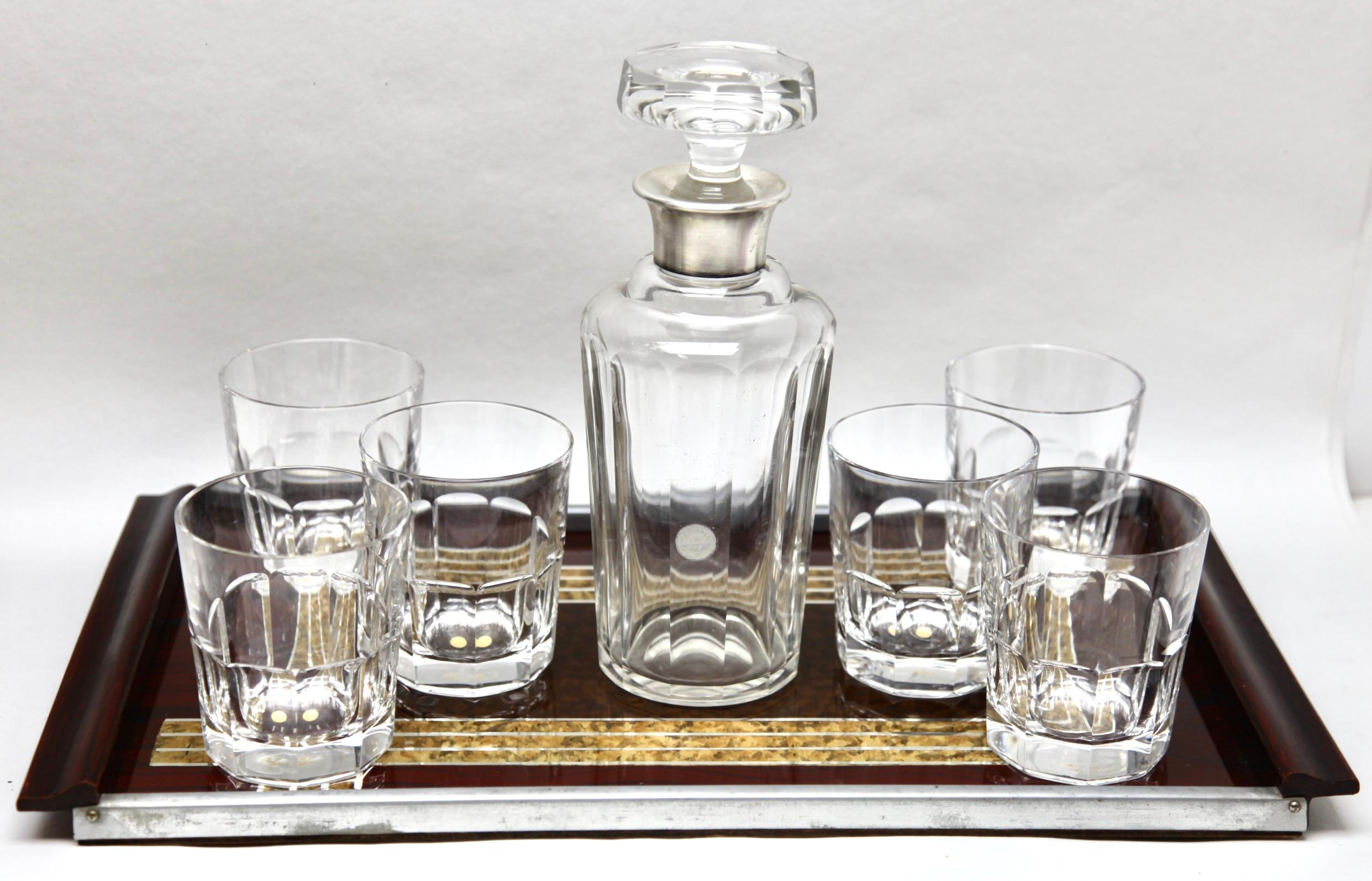 Whisky Set by Val Saint Lambert Decanter + 6 glasses Belgium, with Serving Tray
Glass Factory Val Saint Lambert, Belgium.

Set with a decanter and 6 matching Whisky glasses and a serving tray.
whisky glasses have never been used still in original