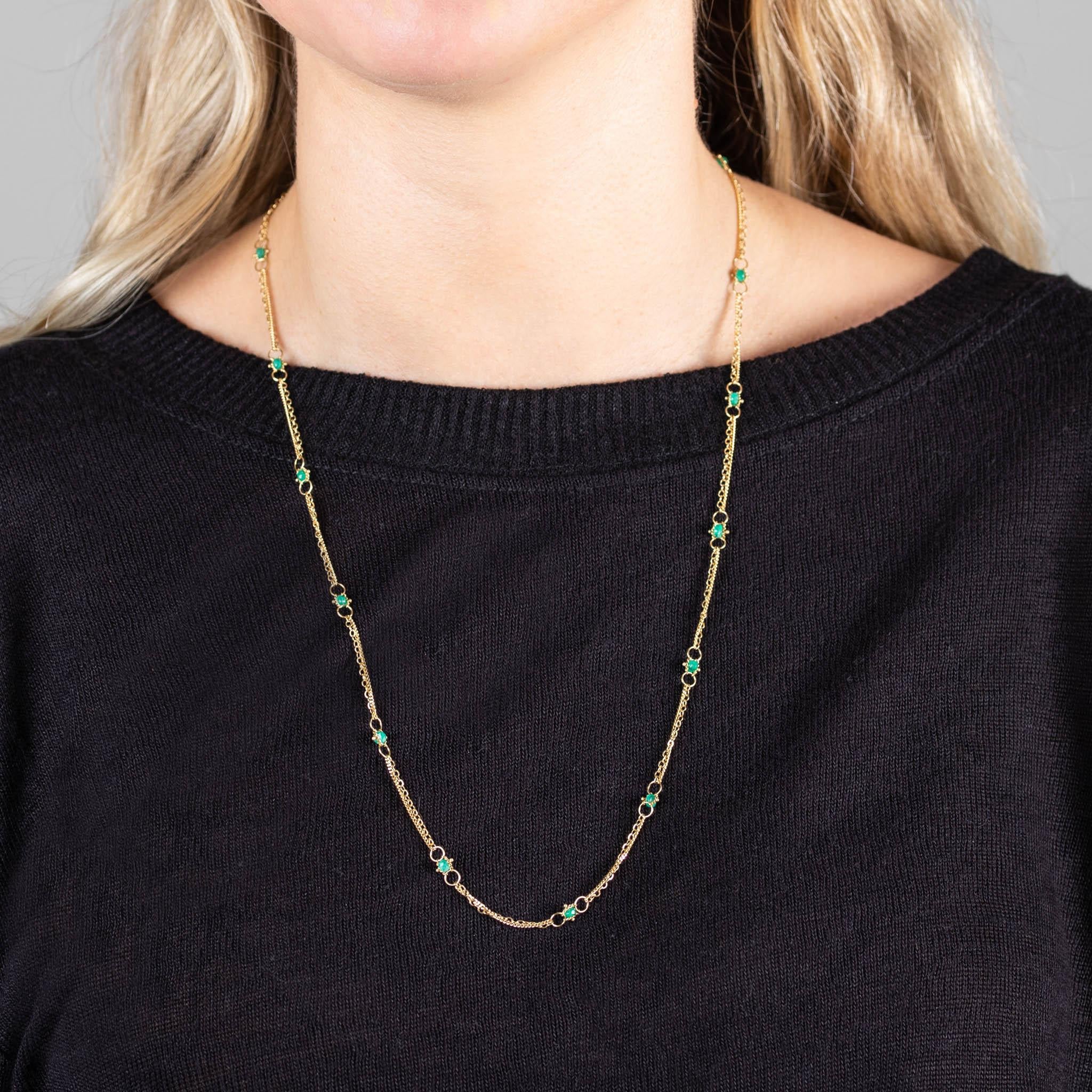 This graceful and refined necklace honors tiny Emerald stones by encircling them with gold. Each stone is hand woven with strands of 18k yellow gold. Emerald is said to bring prosperity and abundance to the wearer - perhaps this necklace will be