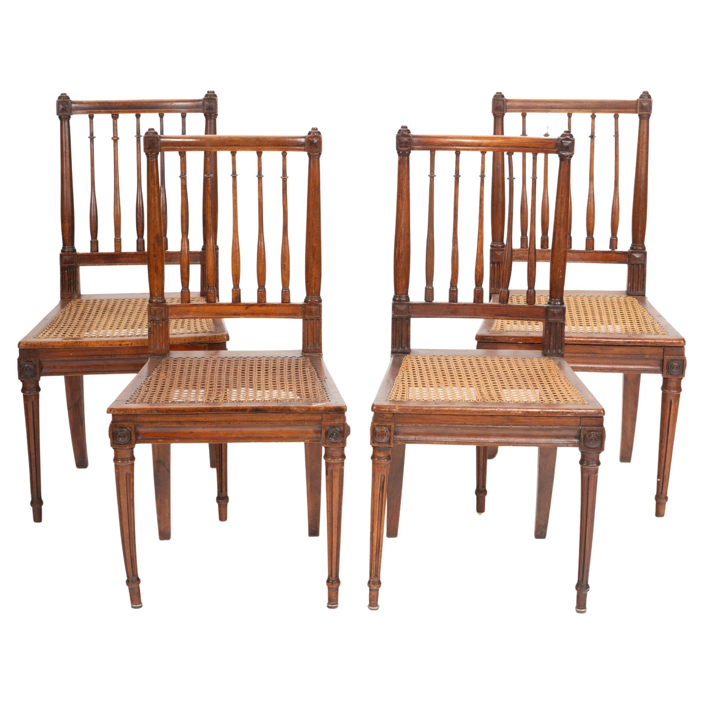 Whispers of the Salon: A Neoclassical Set of Four Turned Side Chairs For Sale