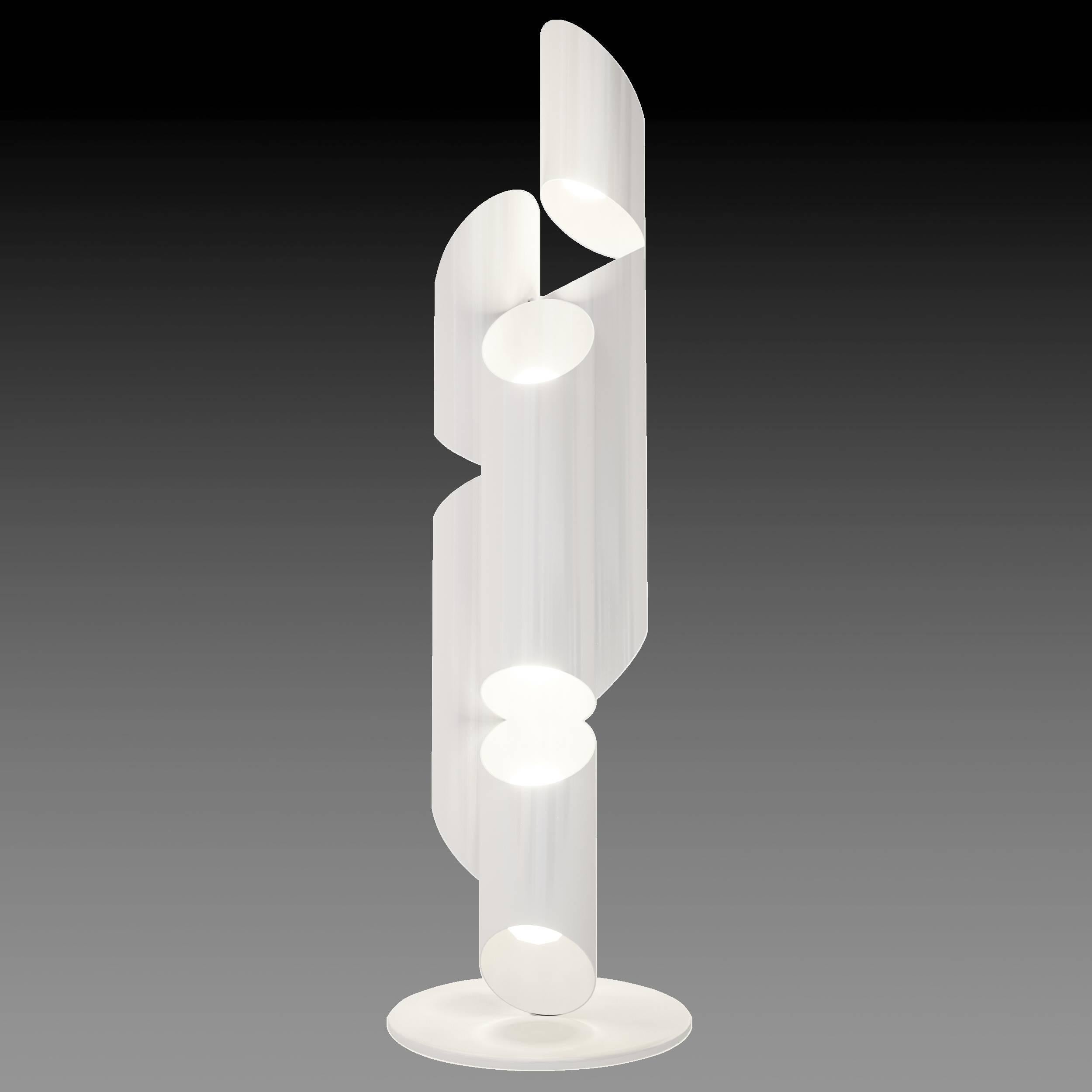 Inspired by church organ pipes, this seven-foot sculptural floor lamp is fabricated in steel and then powder coated in white (or any other desired color). Incandescent light fills each tube and flows out from strategically placed slits creating a