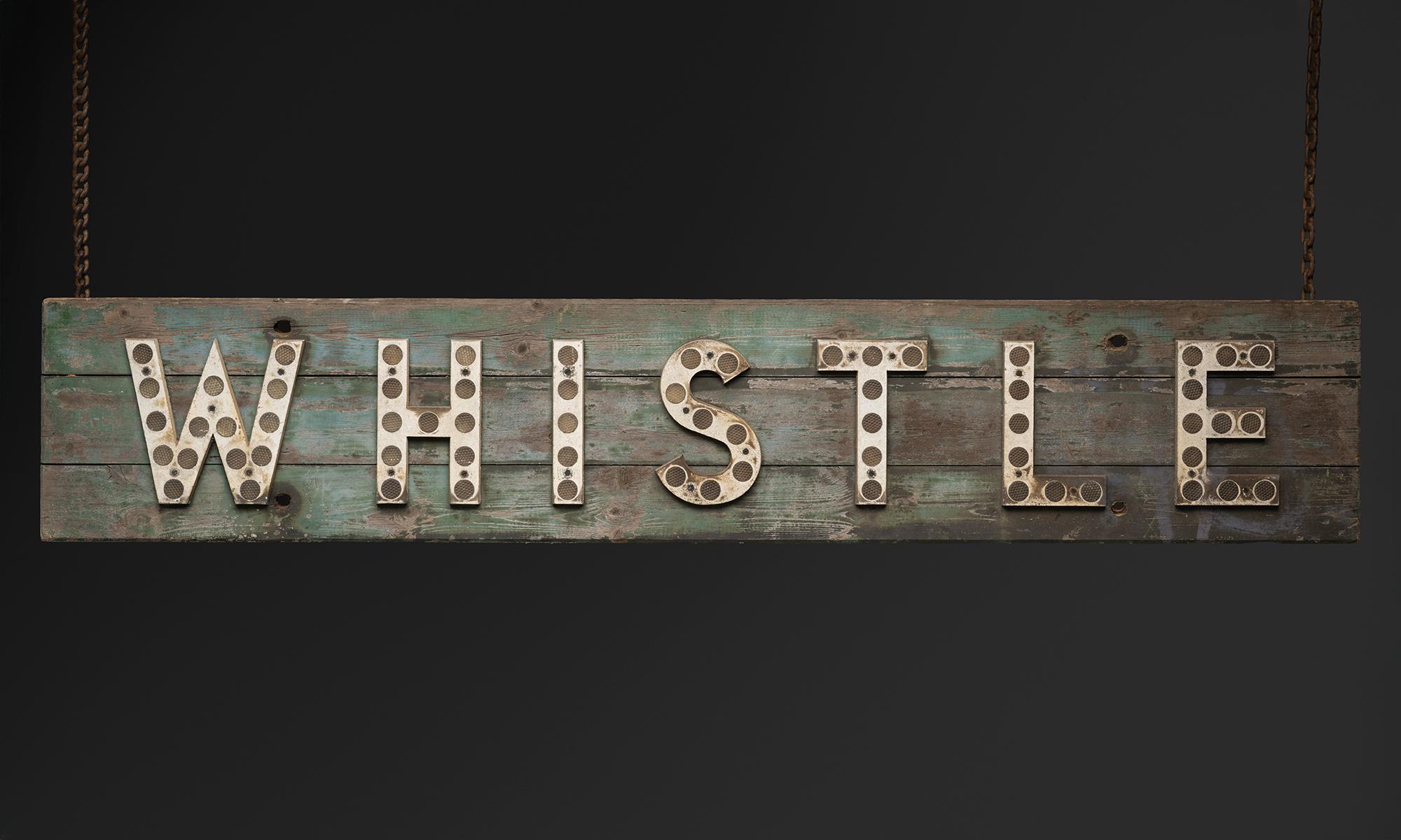 “Whistle” Railway Sign

England, 1870

Painted backboard with alloy letters and glass “cats eye” reflectors.

96