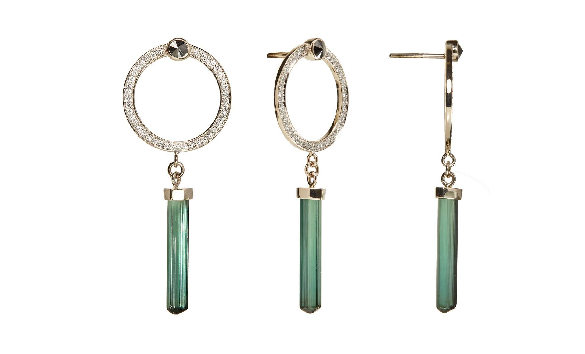 Designed exclusively by Ara Vartanian, this single earring has been conceived in 18k White Gold and adorned with one Green Tourmaline, in a stick fantasy cut, weighing 3,44ct (three carats and forty-four points),  along with 0,20ct (twenty points)