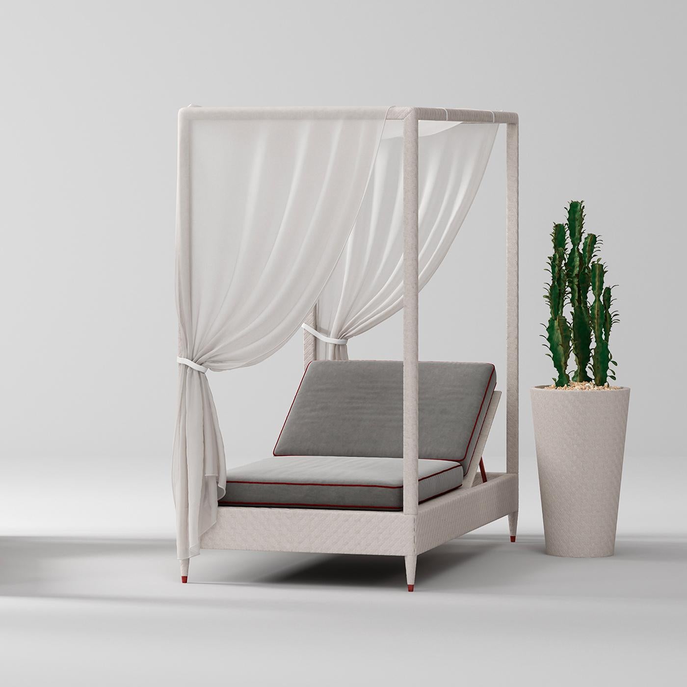 This stunning canopy daybed creates the perfect place to enjoy the outdoors in a stylish design that will stand out in a modern patio, pool, or veranda. Crafted of weather- and water-resistant aluminum covered with handwoven resin, the four-post