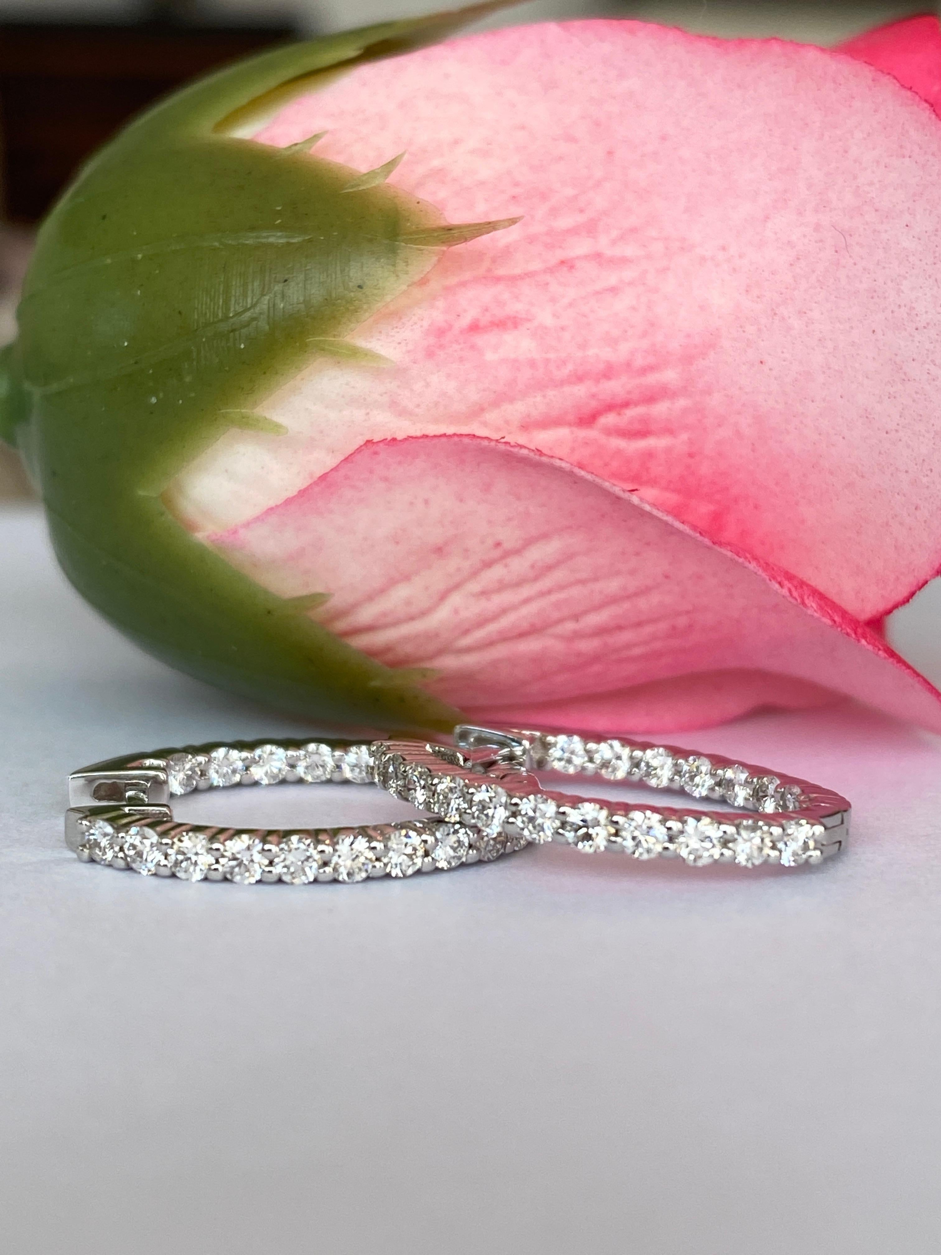 White  gold huggie hoop diamond earrings are a stunning choice! These earrings are designed to hug the earlobe closely, offering a sleek and elegant look. The white gold adds these hoops blend timeless sophistication with modern minimalism.

If