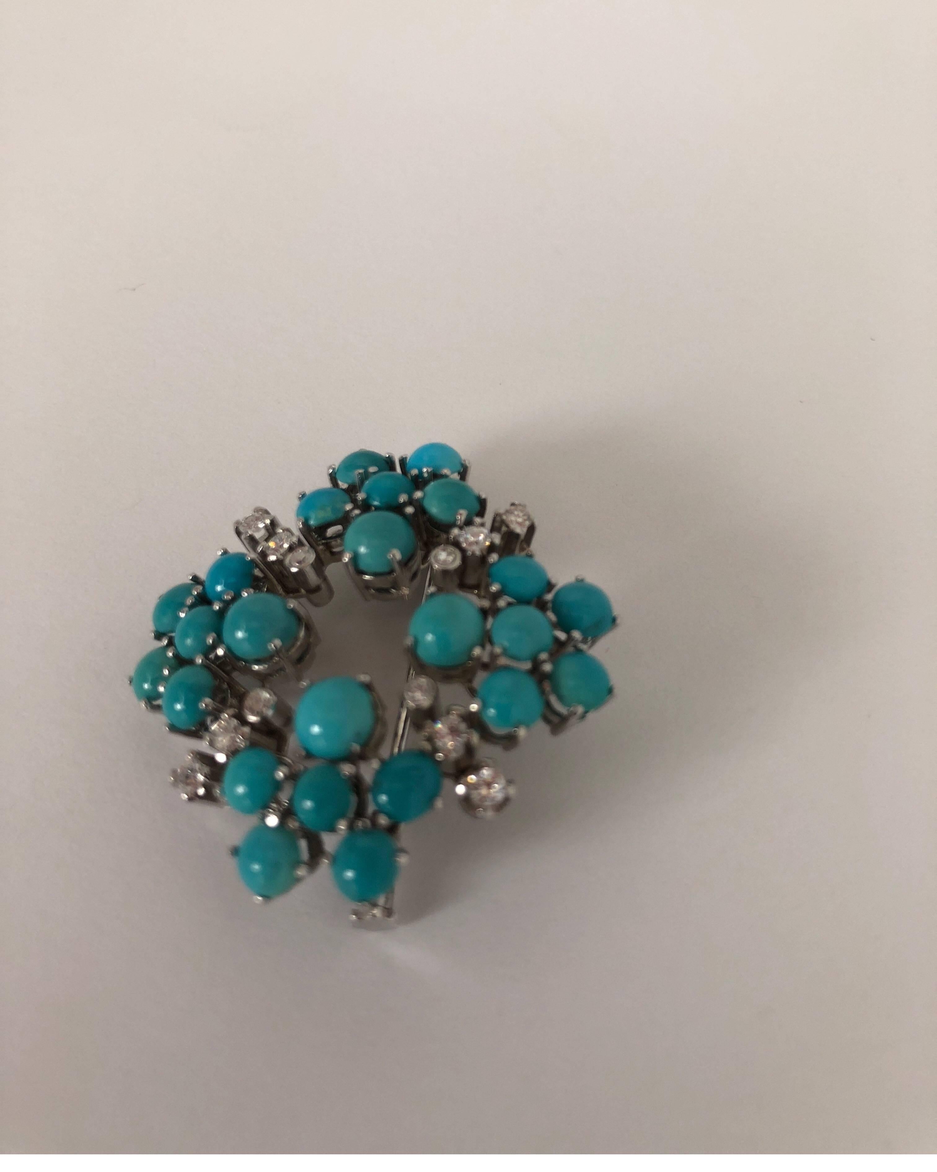 White 18kt gold brooch with white diamonds and turquoise
total weight of gold 10
total weight of turquoise gr 1.02
total weight of diamonds ct 040
STAMP 750